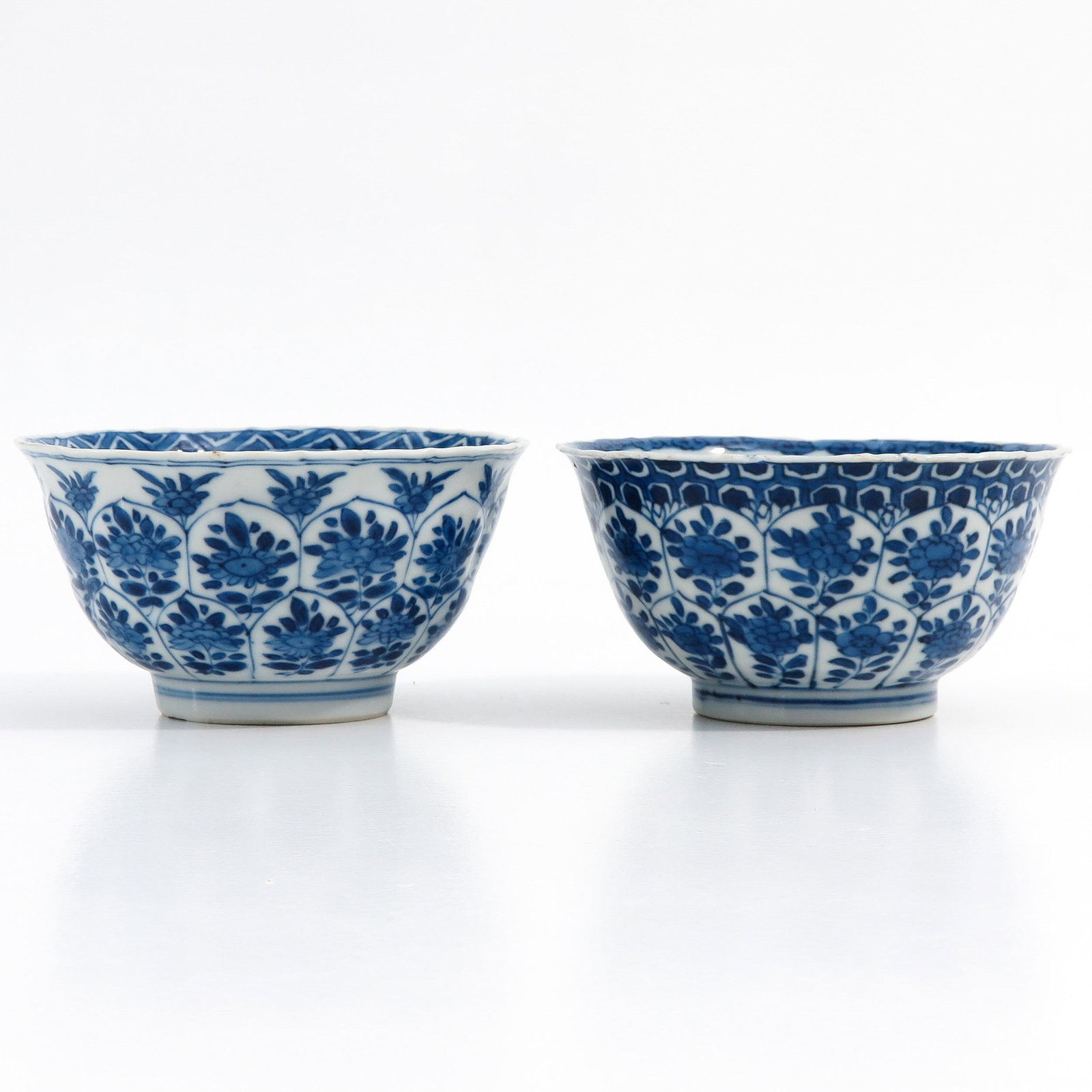A Lot of 2 Blue and White Bowls: Floral decor, including double ring and censer, 11 cm. in diameter, chip.