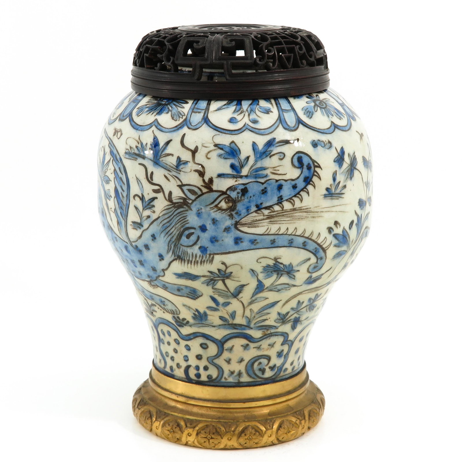 A Blue and White Vase with Cover: Mounted on bronze base with carved wood cover, decorated with dragons and flowers, 36 cm. tall including cover.