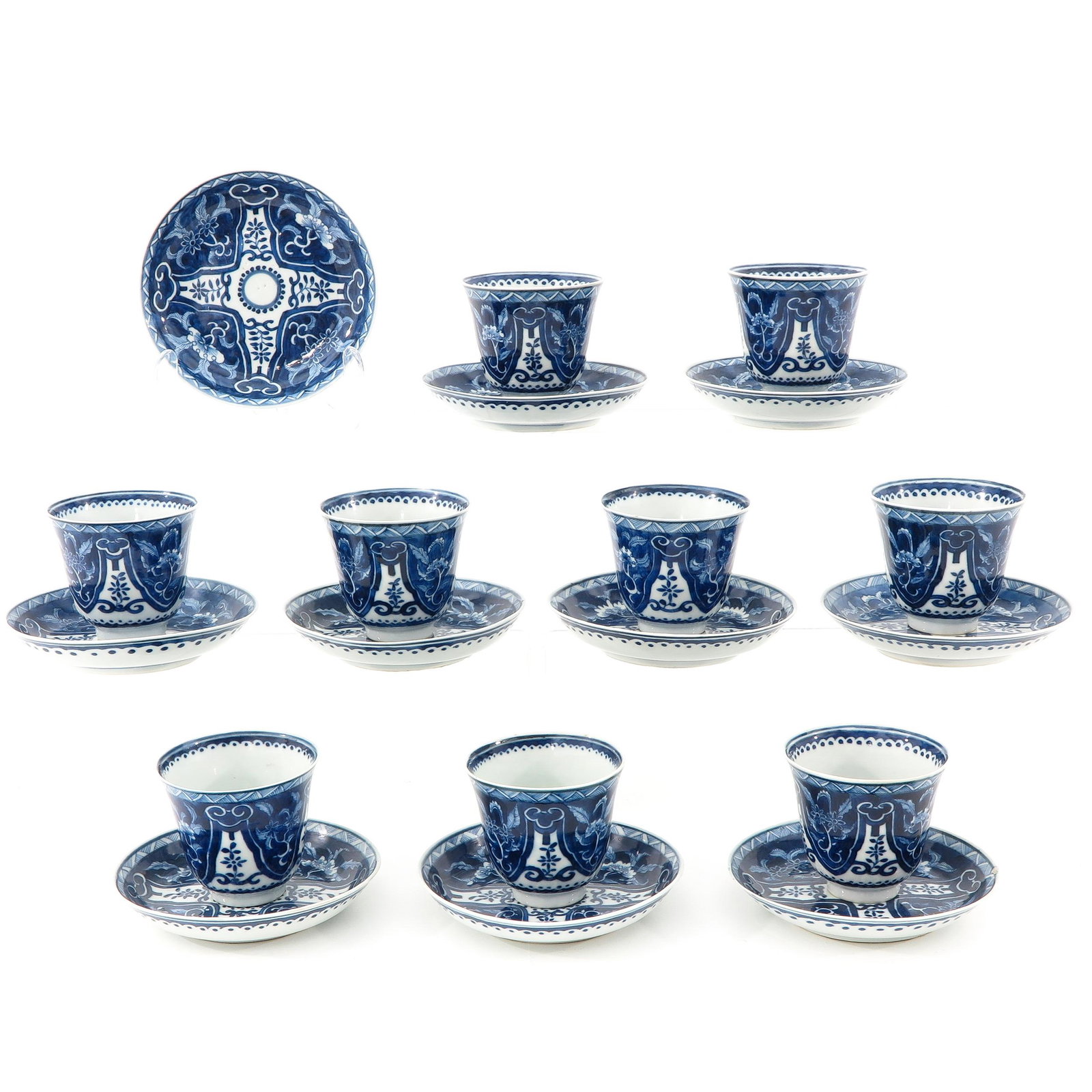 A Collection of Cups and Saucers: Including 9 cups and 10 saucers, floral decor, saucers are 13 cm. in diameter, in diverse conditions.