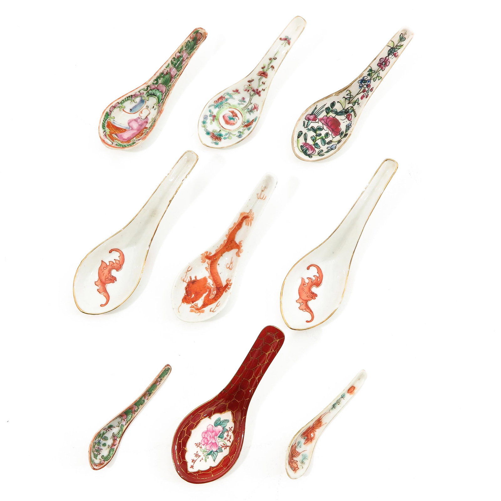 A Lot of 9 Spoons: In a variety of decors and sizes, largest spoon is 15 cm. long.