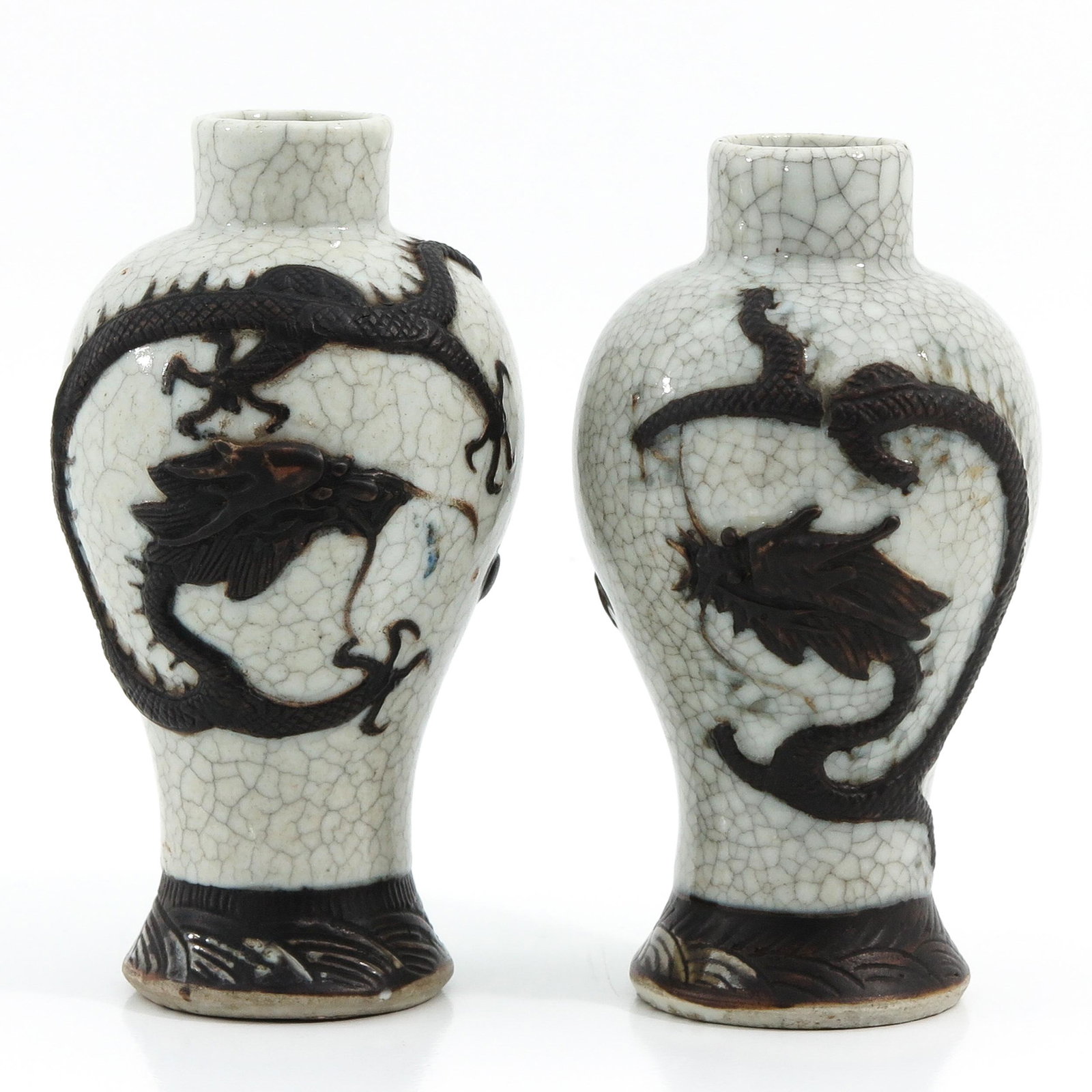 A Pair of Nanking Vases: Dragon decor, 18 cm. tall.