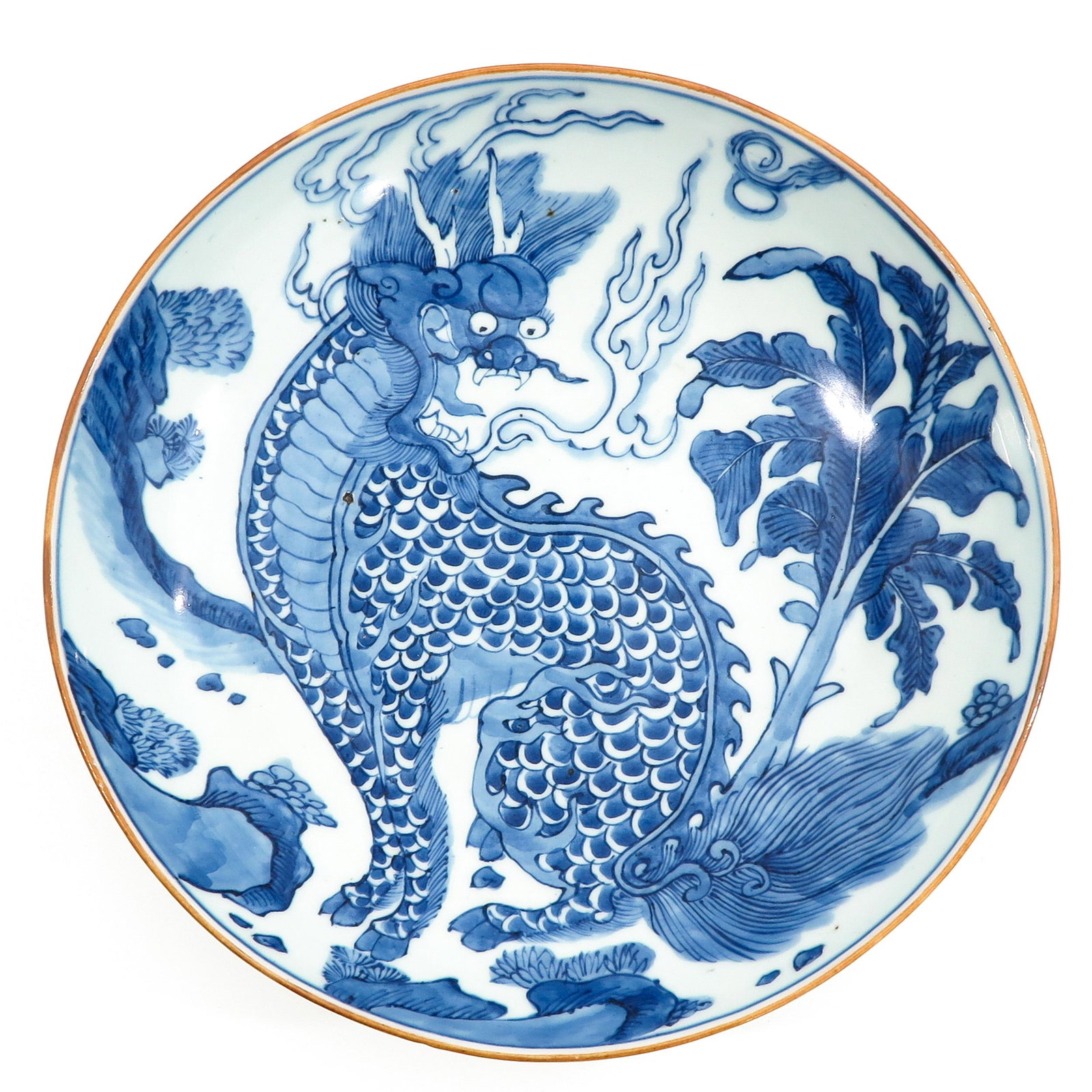 A Blue and White Charger: Depicting Kylin in garden, 34 cm. in diameter.