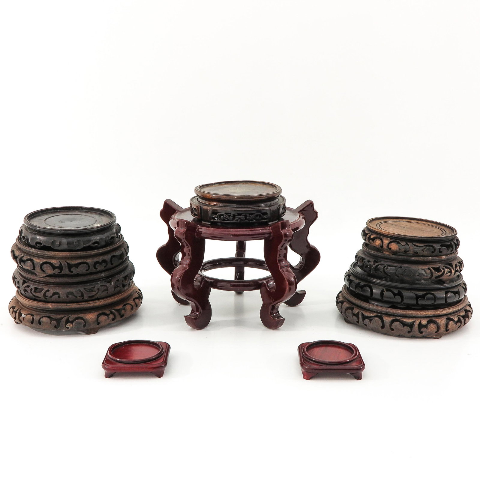 A Large Collection of Wood Bases: Including 12 bases in diverse sizes.