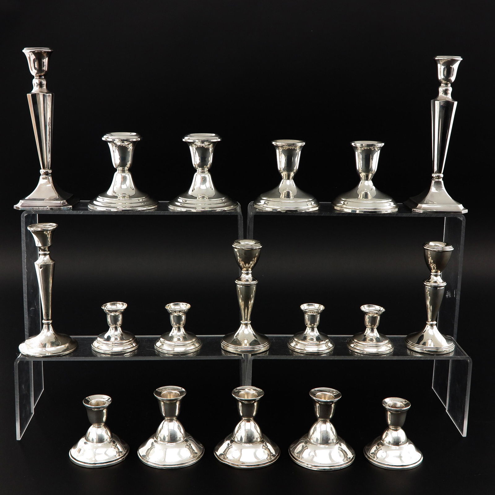 A Collection of 18 Silver Candlesticks (1 of 9)