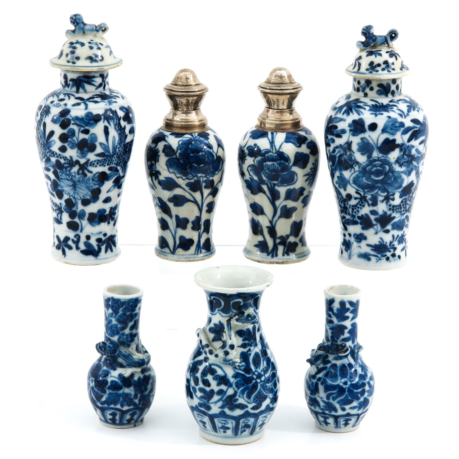 A Collection of 7 Small Vases (1 of 9)