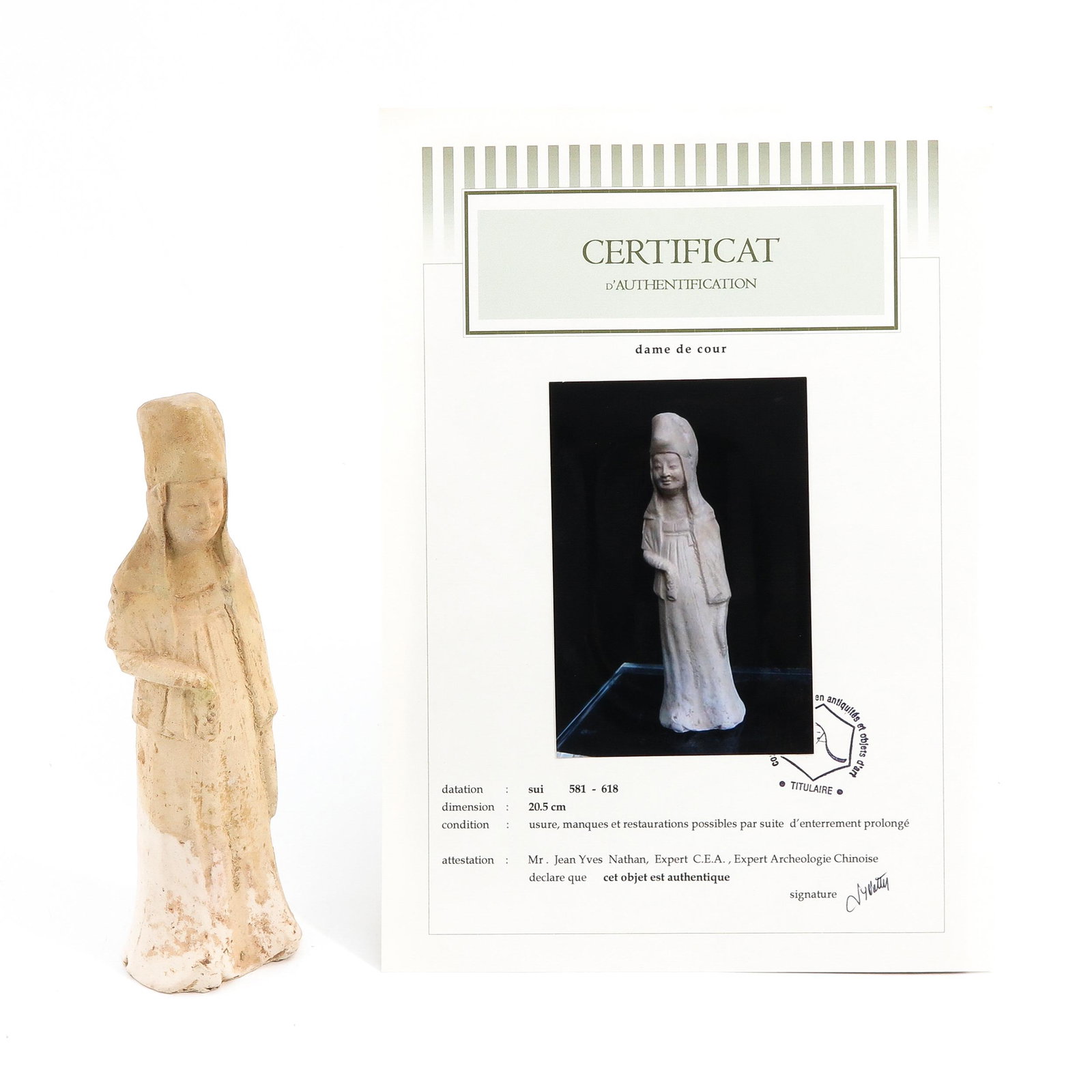 A Chinese Pottery Tomb Figure: Sui Dynasty, 20 cm. tall, depicting court lady, sold with certificate of Authenticity of Age signed by expert Mr. Jean Yves Nathan, expert in Chinese Archeology.