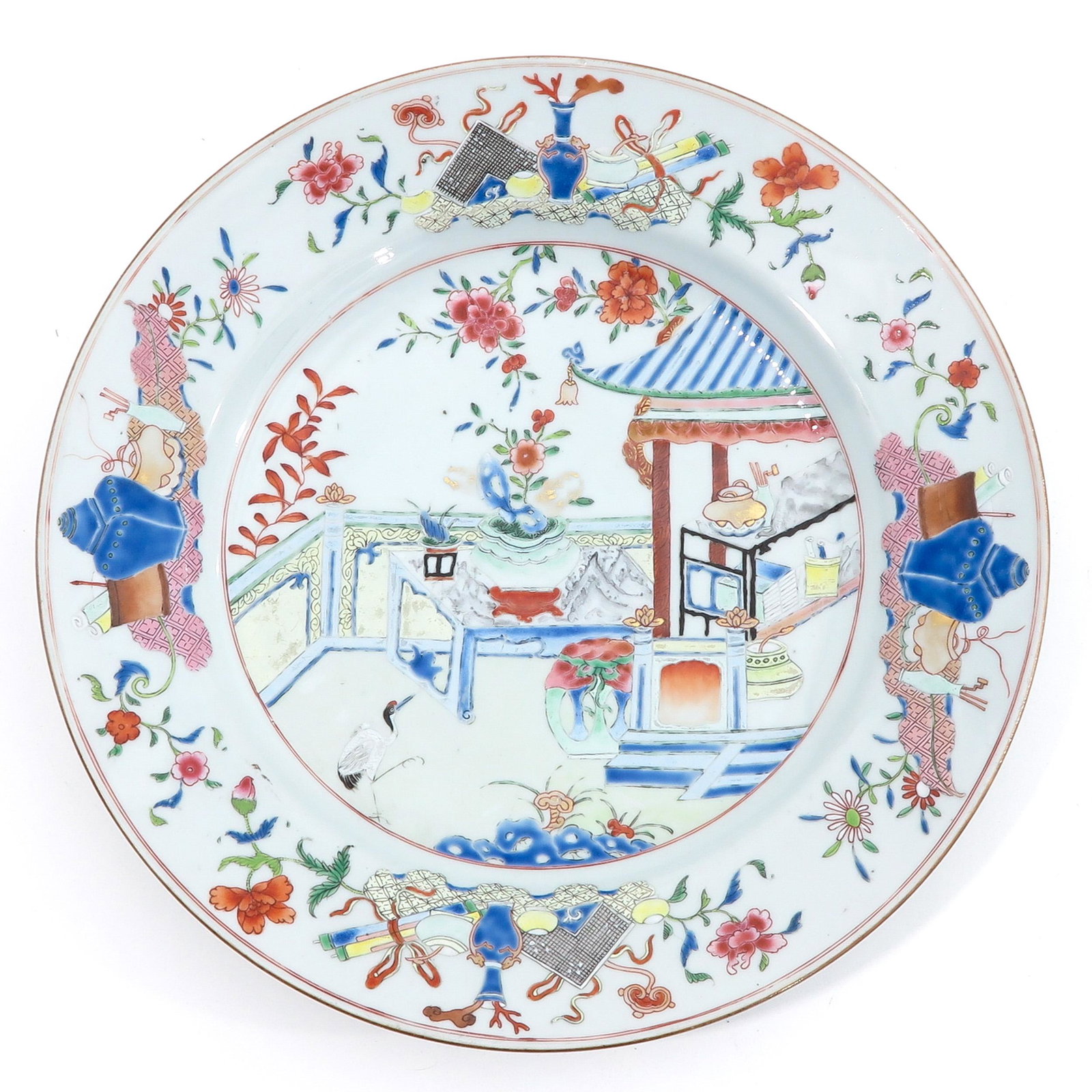 A Famille Rose Charger: Depicting scene in garden with flowers and Chinese antiquities, 35 cm. in diameter.