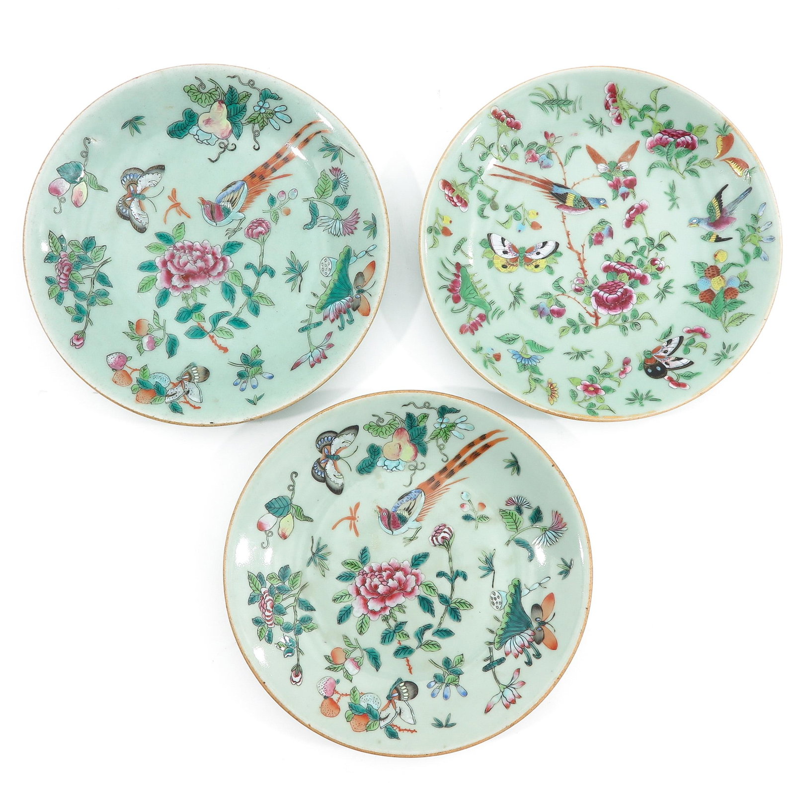 A Series of 3 Cantonese Plates: Decorated with butterflies and flowers, 25 cm. in diameter.