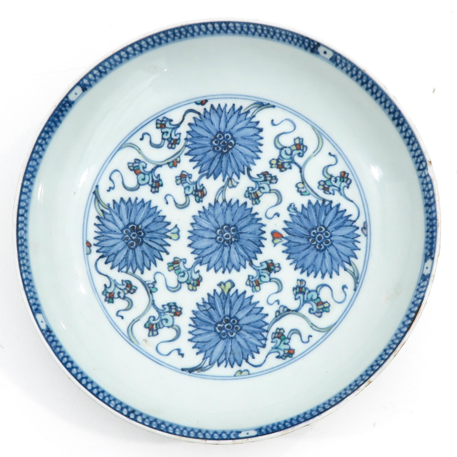 A Blue and White Plate: Floral decor, 21 cm. in diameter.