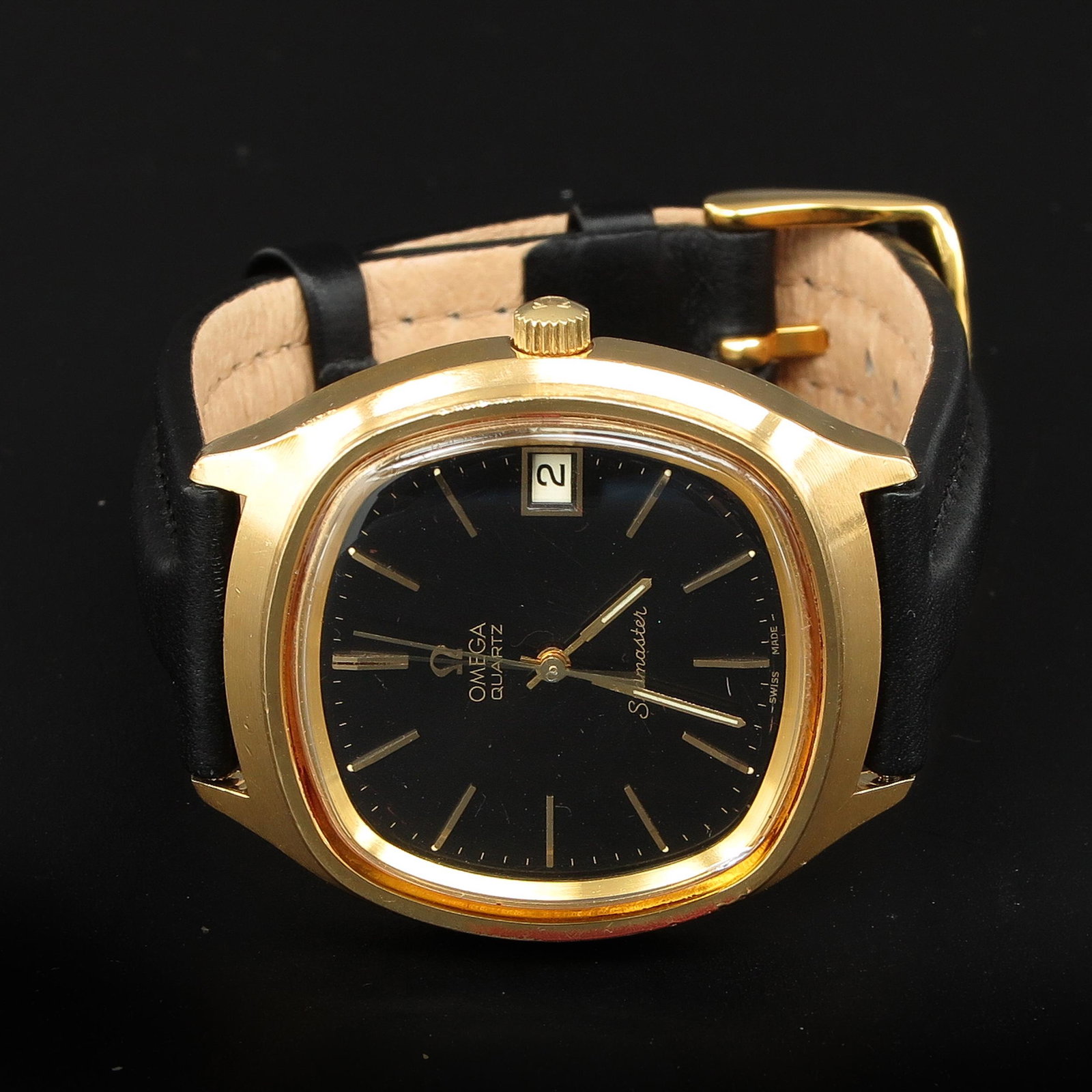 A Mens Omega Seamaster: On leather band, case is 38 mm. in diameter.