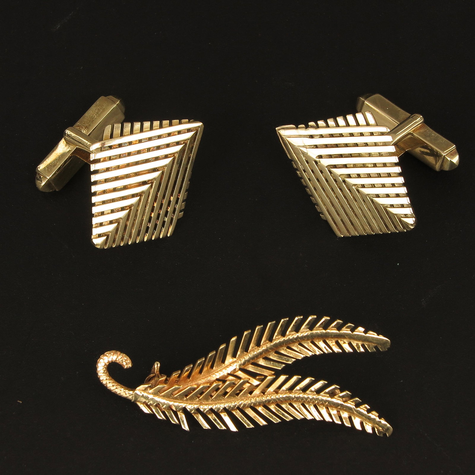 A Collection of Jewelry: Including 14KG cuff links.