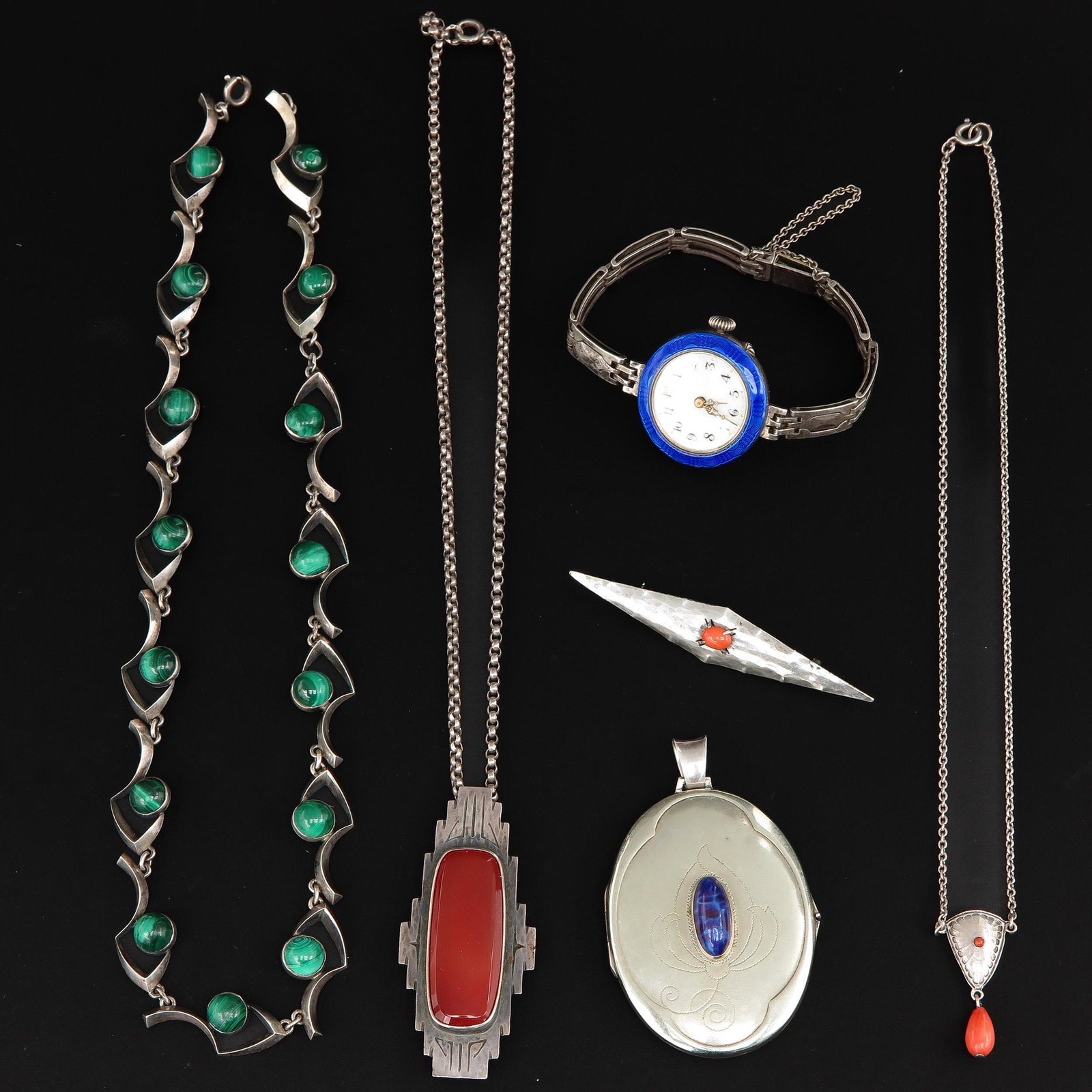 A Collection of Vintage Jewelry: Including Amsterdam School brooch, 69 mm. long, set with red coral.