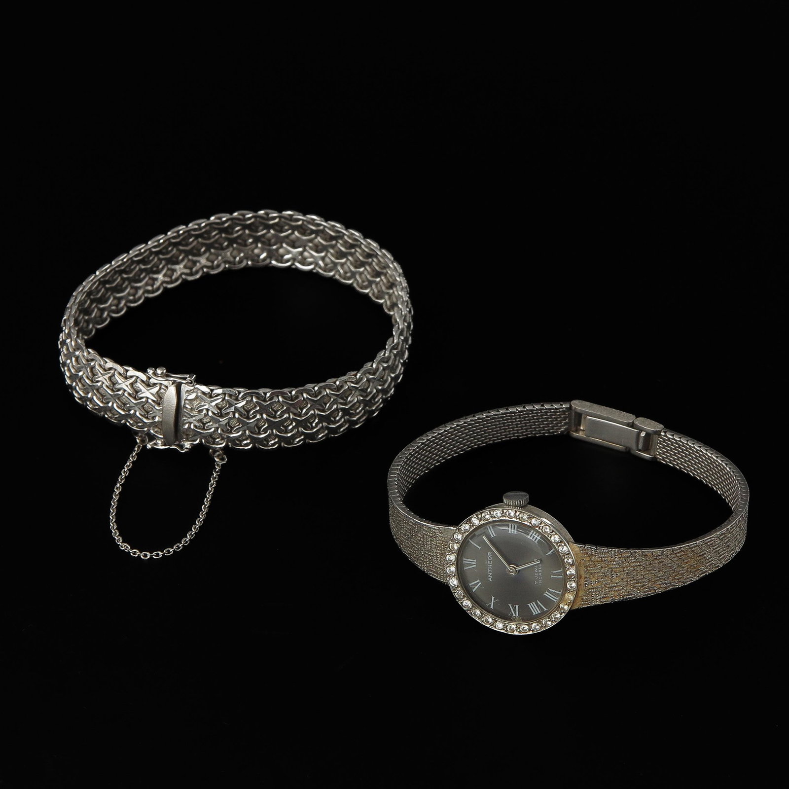 A Collection of Jewelry: Including 18KG ladies watch by Antheor and set with diamonds.
