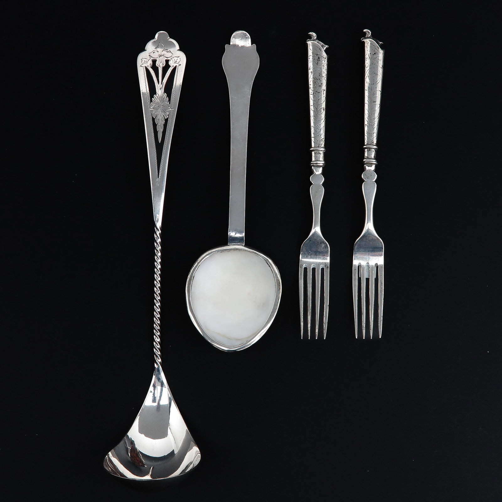 A Collection of Silver: 4 pieces, including 2 forks 1846, longest is 25 cm.