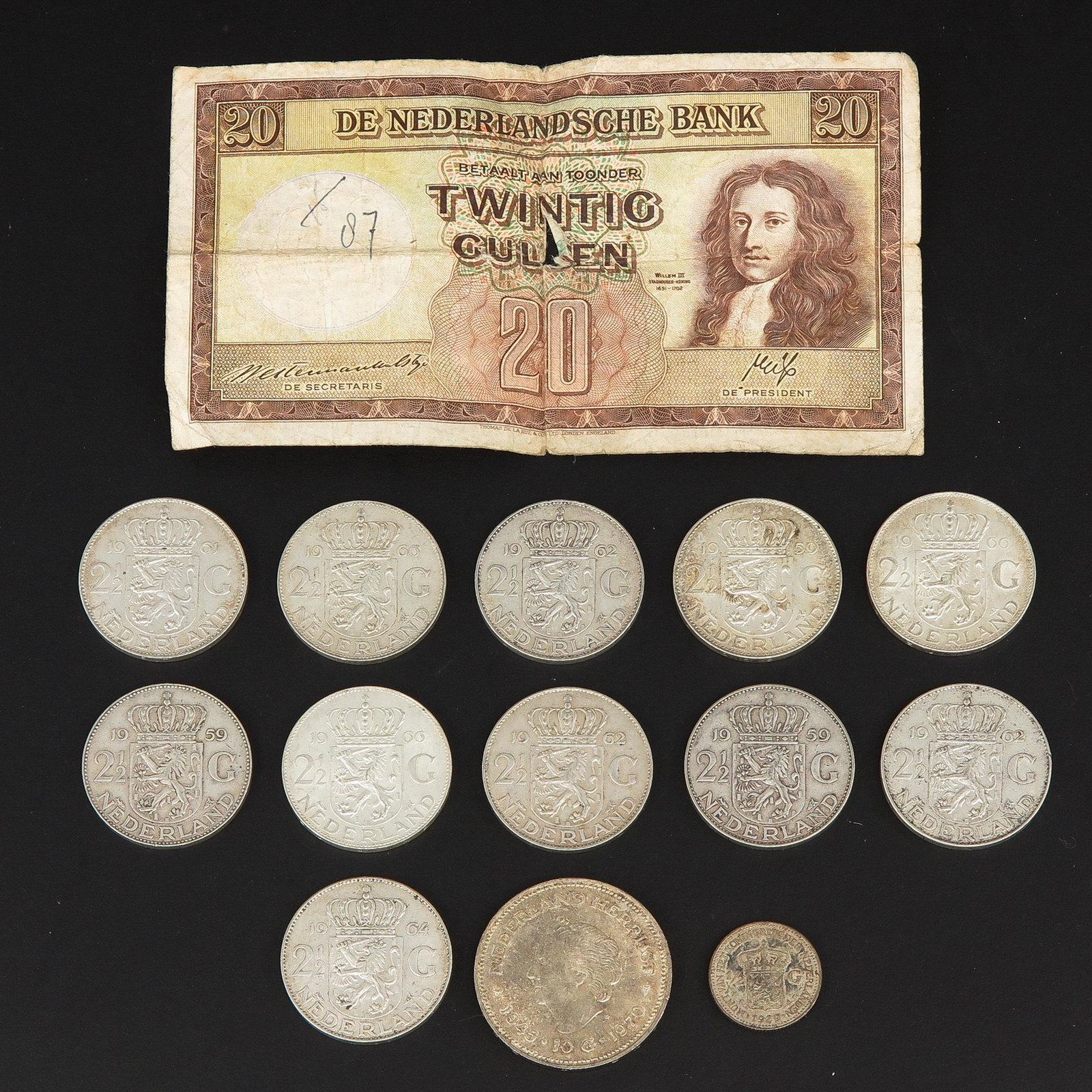 A Lot of Silver Coins: Diverse collection of coins.