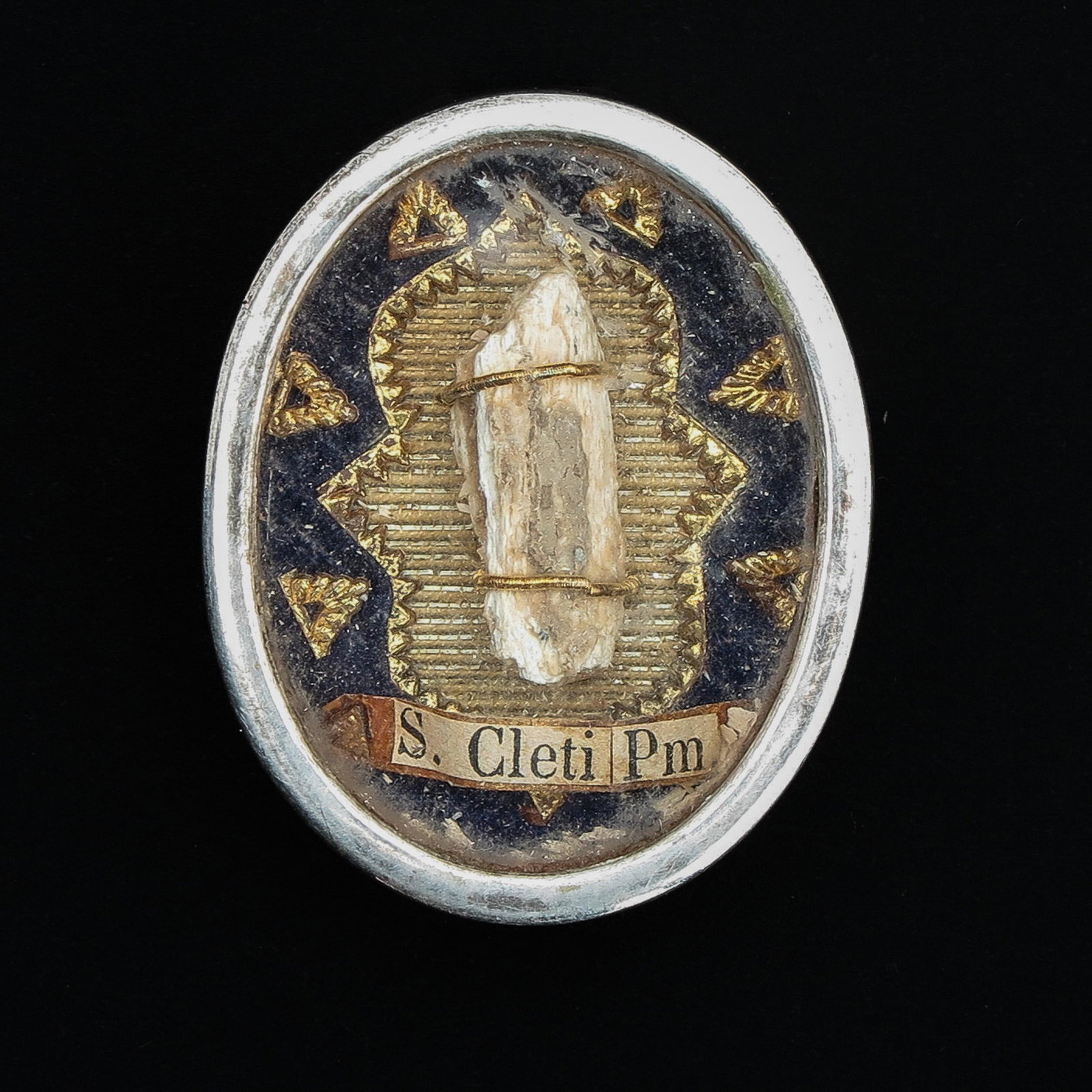 A Saint Cleti Relic with Certificate: 4 cm. tall.