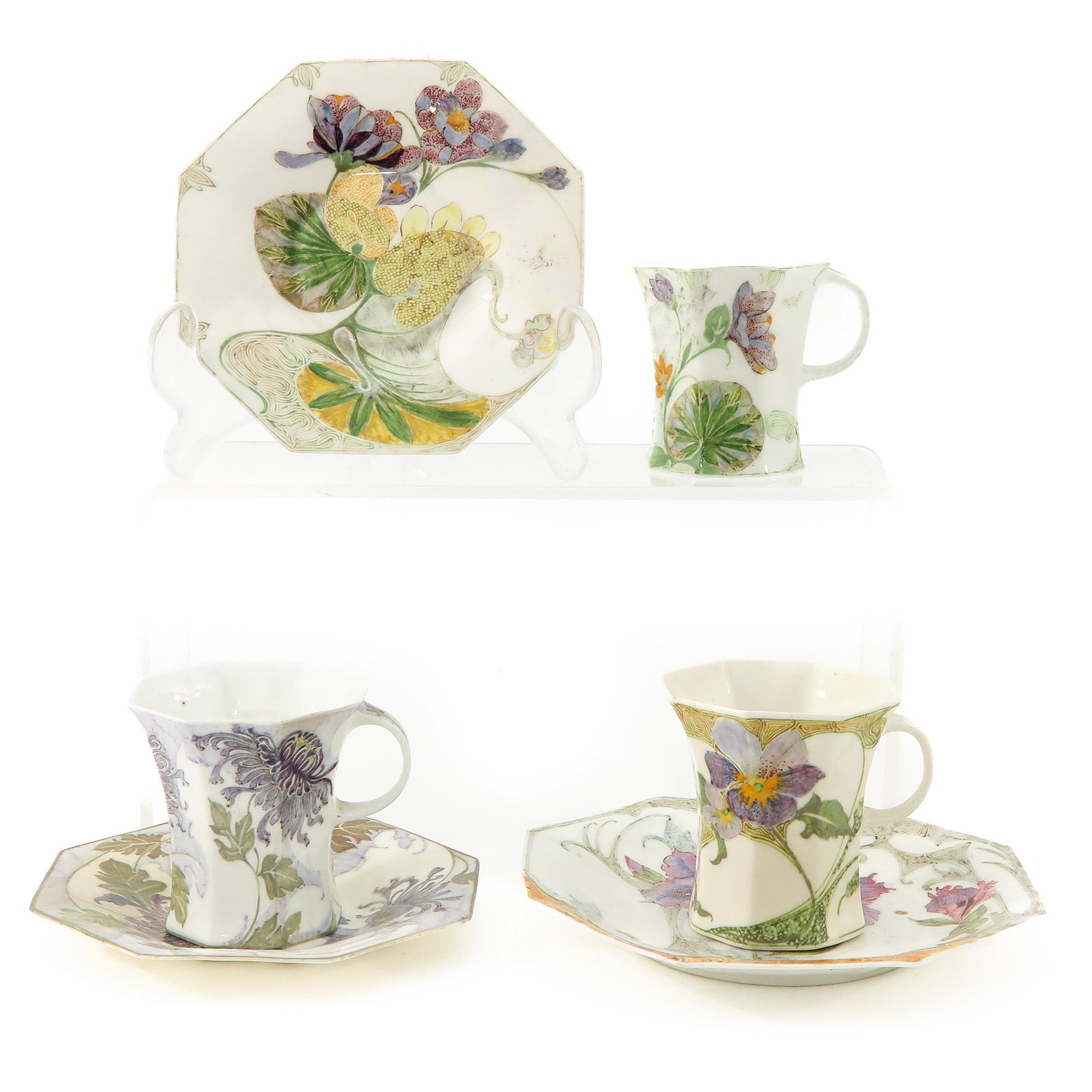 A Collection of Rozenburg Den Haag Cups and Sauce: Saucers are 12 cm. in diameter, with restorations.