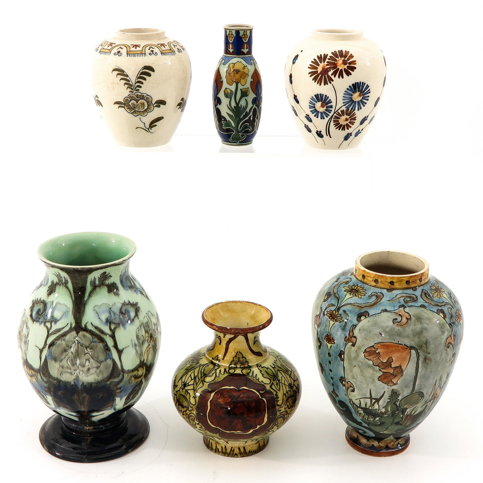 A Collection of Pottery: 6 pieces, including Rozenburg Den Haag, tallest is 18 cm.