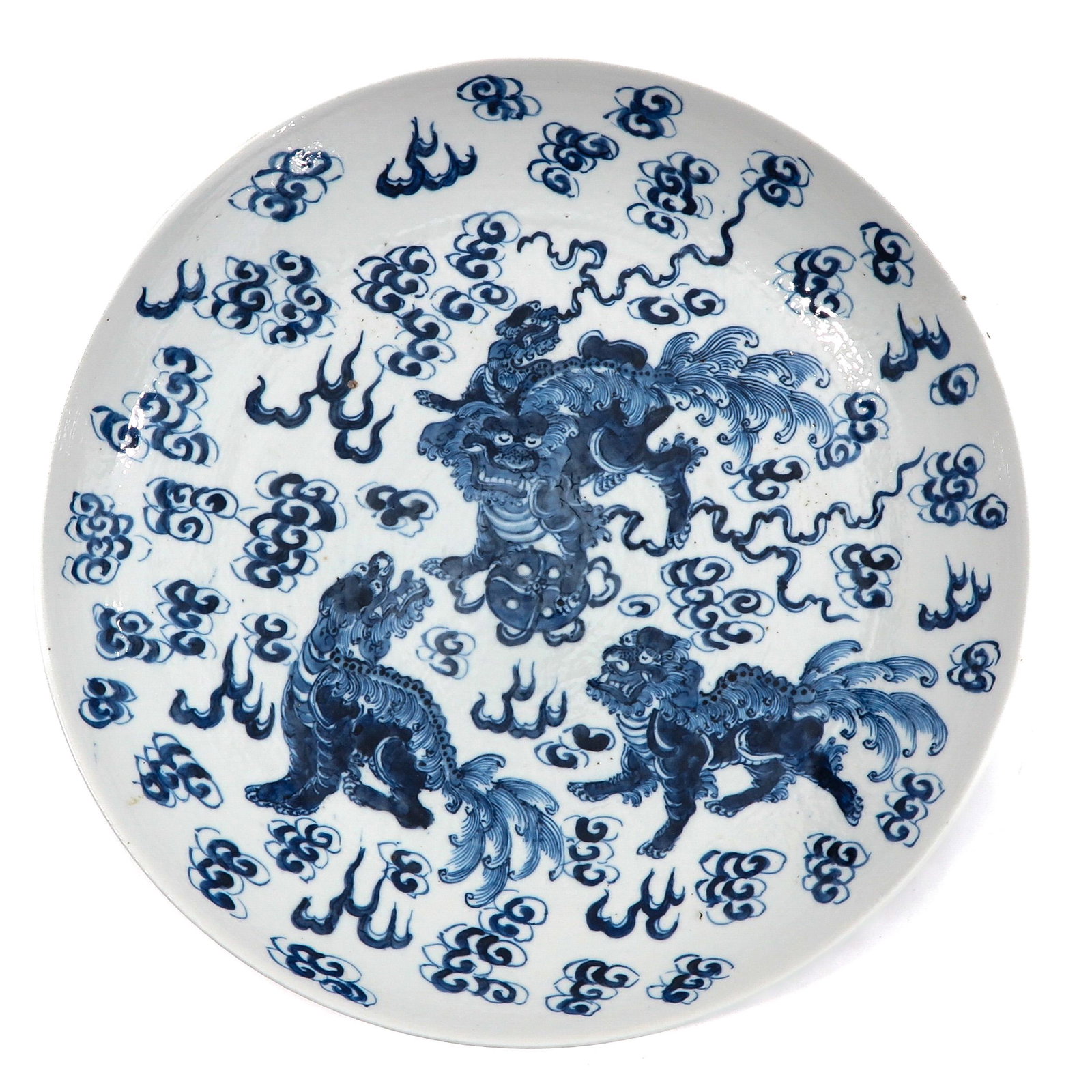 A Blue and White Charger: Decorated with temple liions, 34 cm. in diameter.