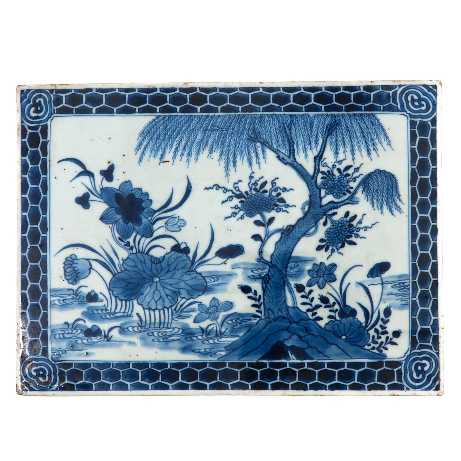 A Blue and White Tile: Depicting scene on pond with water lillies, 32 x 23 cm.
