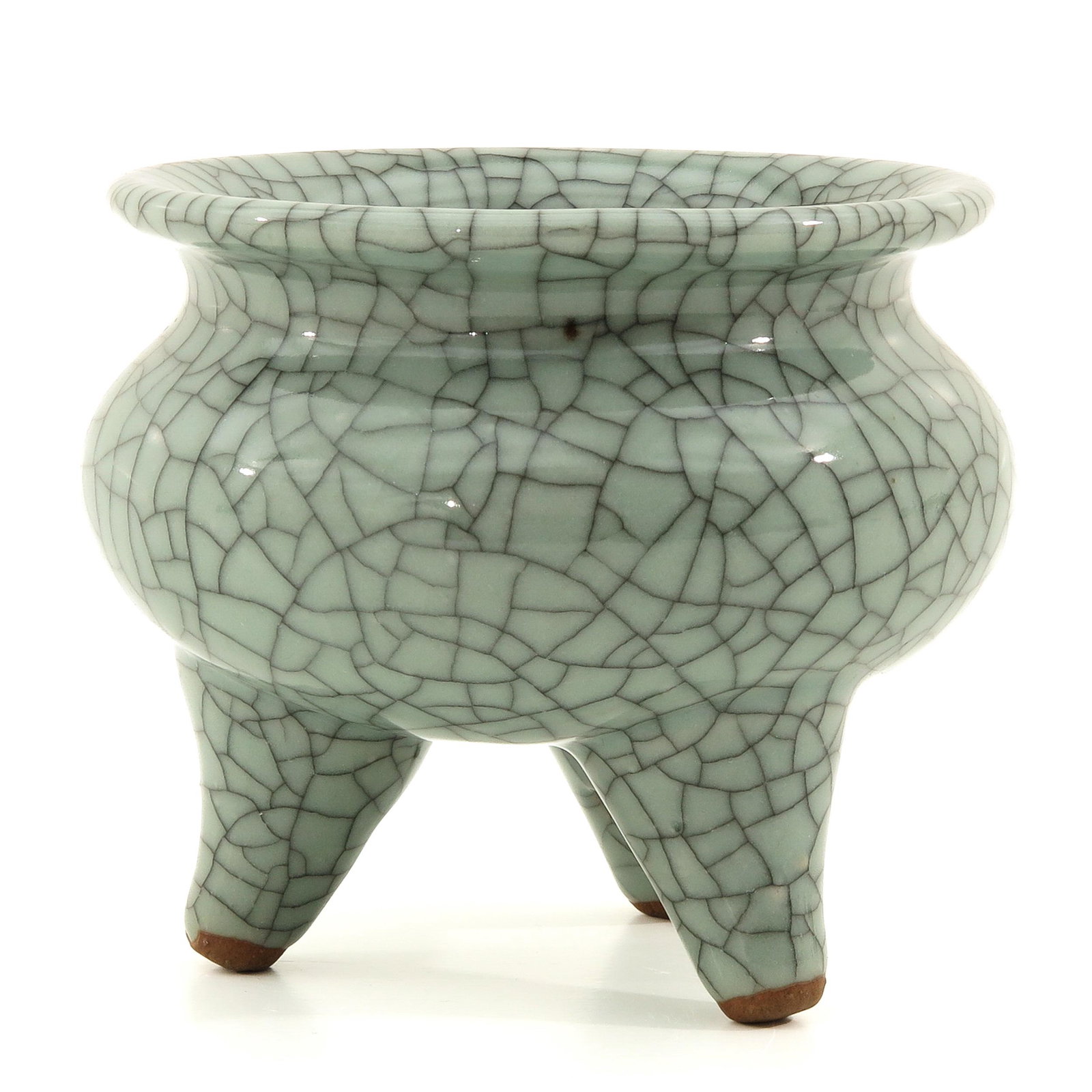 A Celadon Tripod Censer: Crackle ground, 12 cm. in diameter x 10 cm. tall.