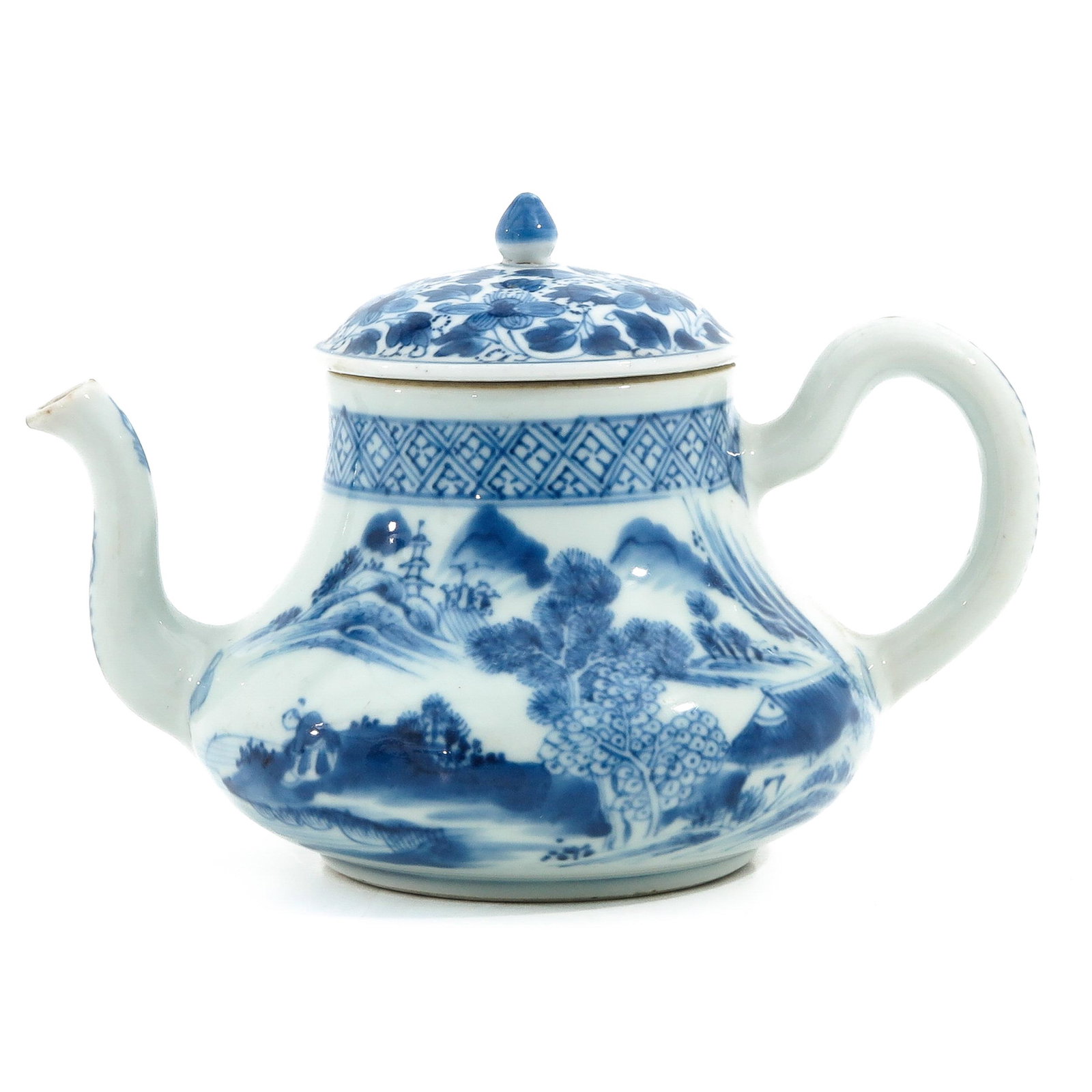 A Blue and White Teapot: Landscape decor, 13 cm. tall.
