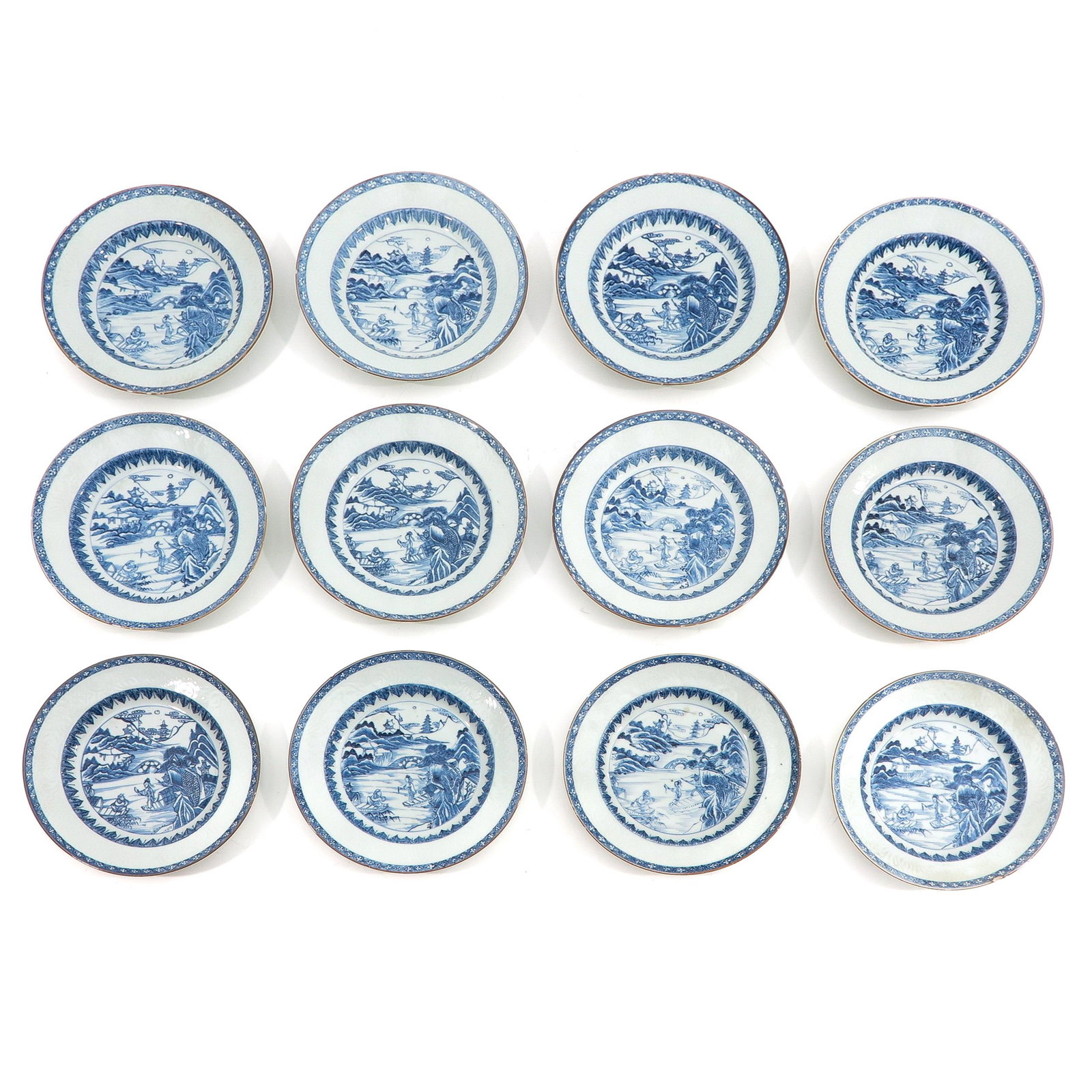 A Series of 12 Blue and White Plates: Landscape decor with Chinese figures, 22 cm. in diameter, chip and hairline.