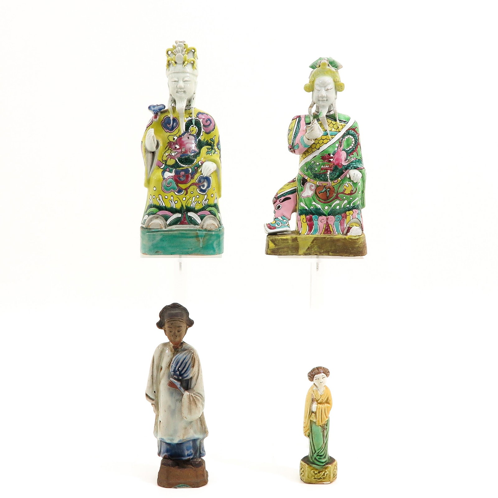 A Collection of 4 Chinese Sculptures: Tallest sculpture is 25 cm., in diverse conditions.