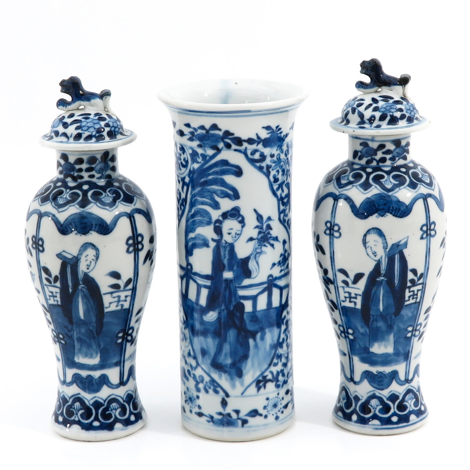 A Lot of 3 Garniture Vases: Depicting Chinese ladies in garden, Kangxi mark, 23 cm. tall, chip.