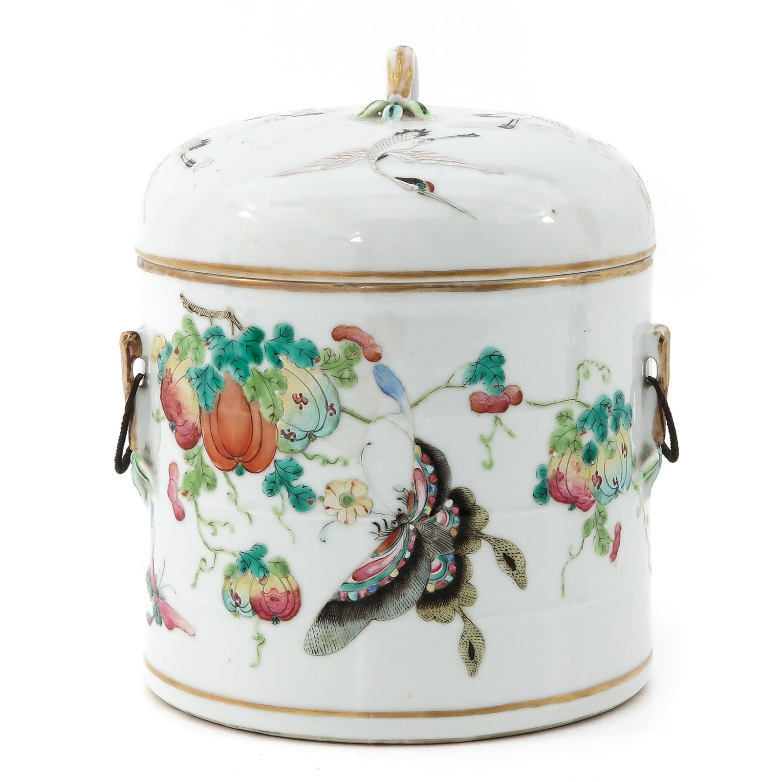 A Round Jar with Cover: Depicting cranes and fruit with butterflies, 19 cm. tall.
