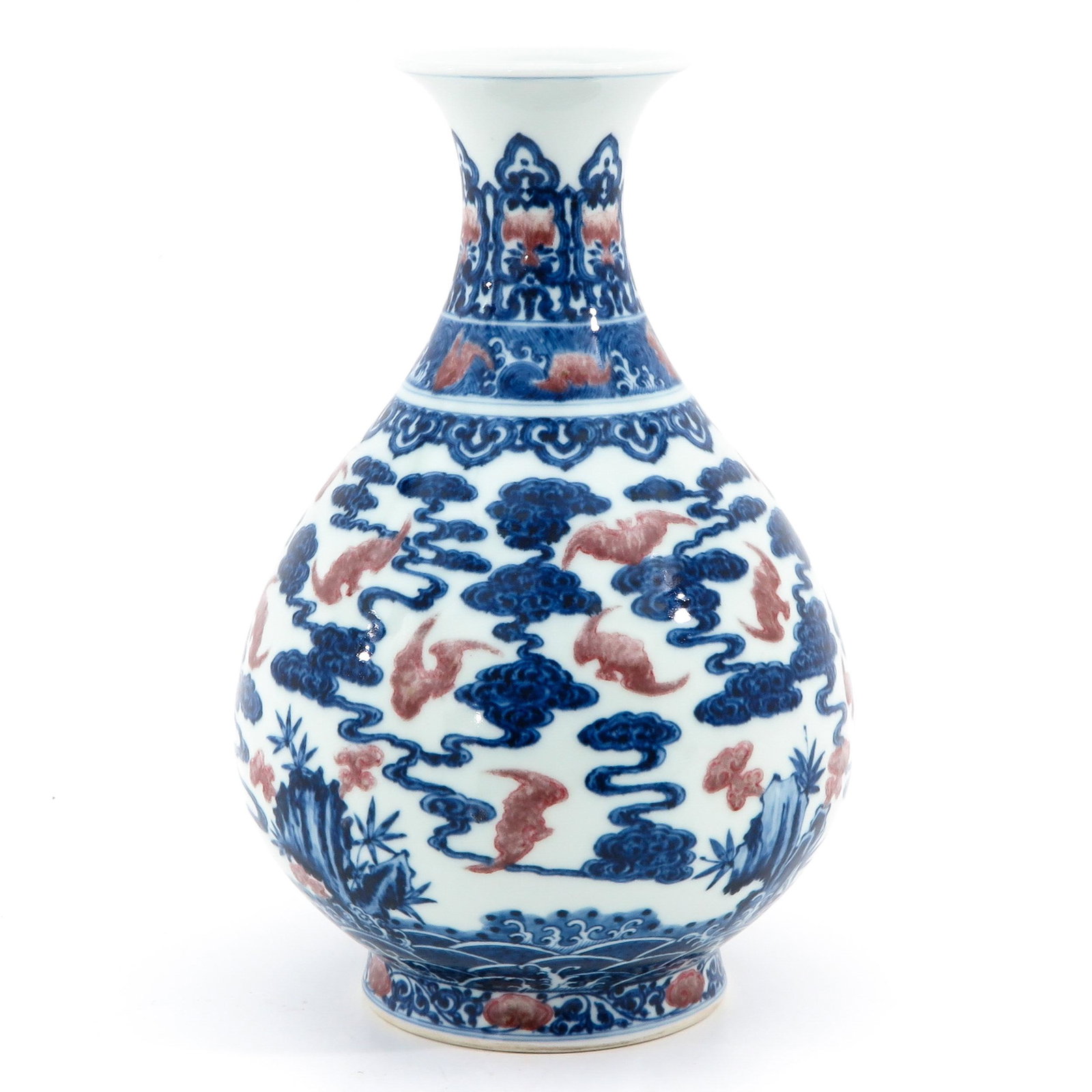 A Blue and Red Vase: Depicting scene in garden with bats and clouds, Yongzheng mark, 30 cm. tall.