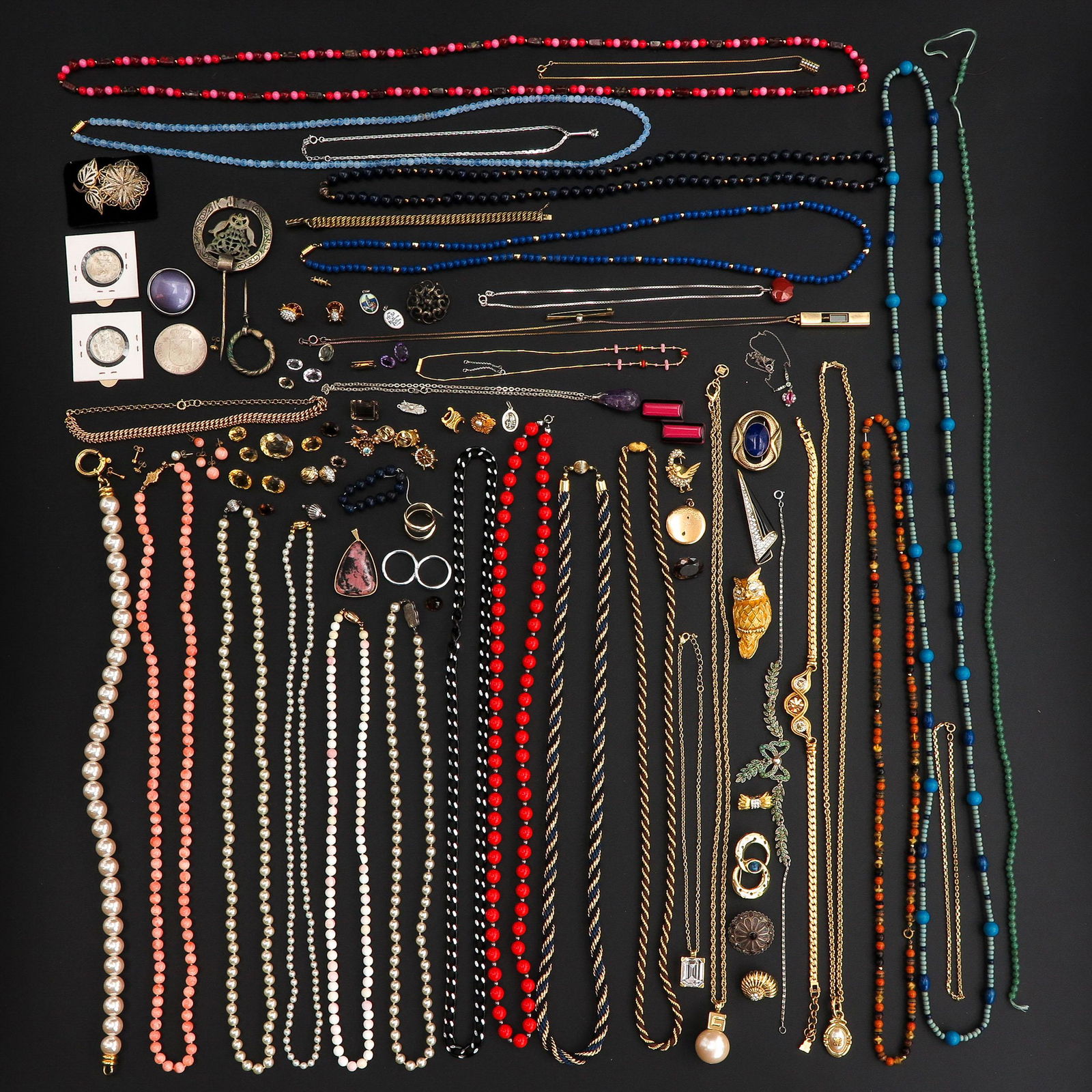 A Collection of Coins and Jewelry: Including Lapis Lazuli, angel skin coral and jewelry from Givenchy.