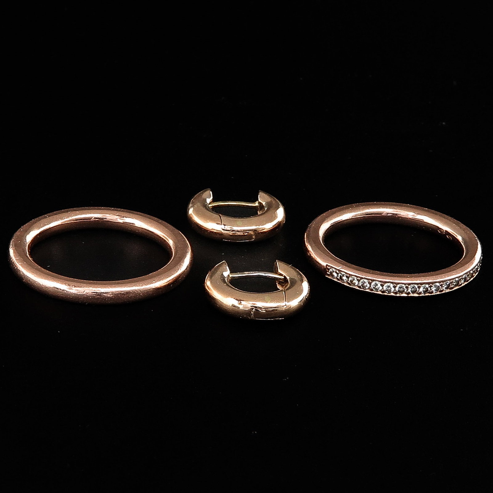 A 14KG Diamond Earrings and Ring Set: Ring set with 18 brilliant cut diamonds, size 20.5. and 1 pair of 14KG earrings.