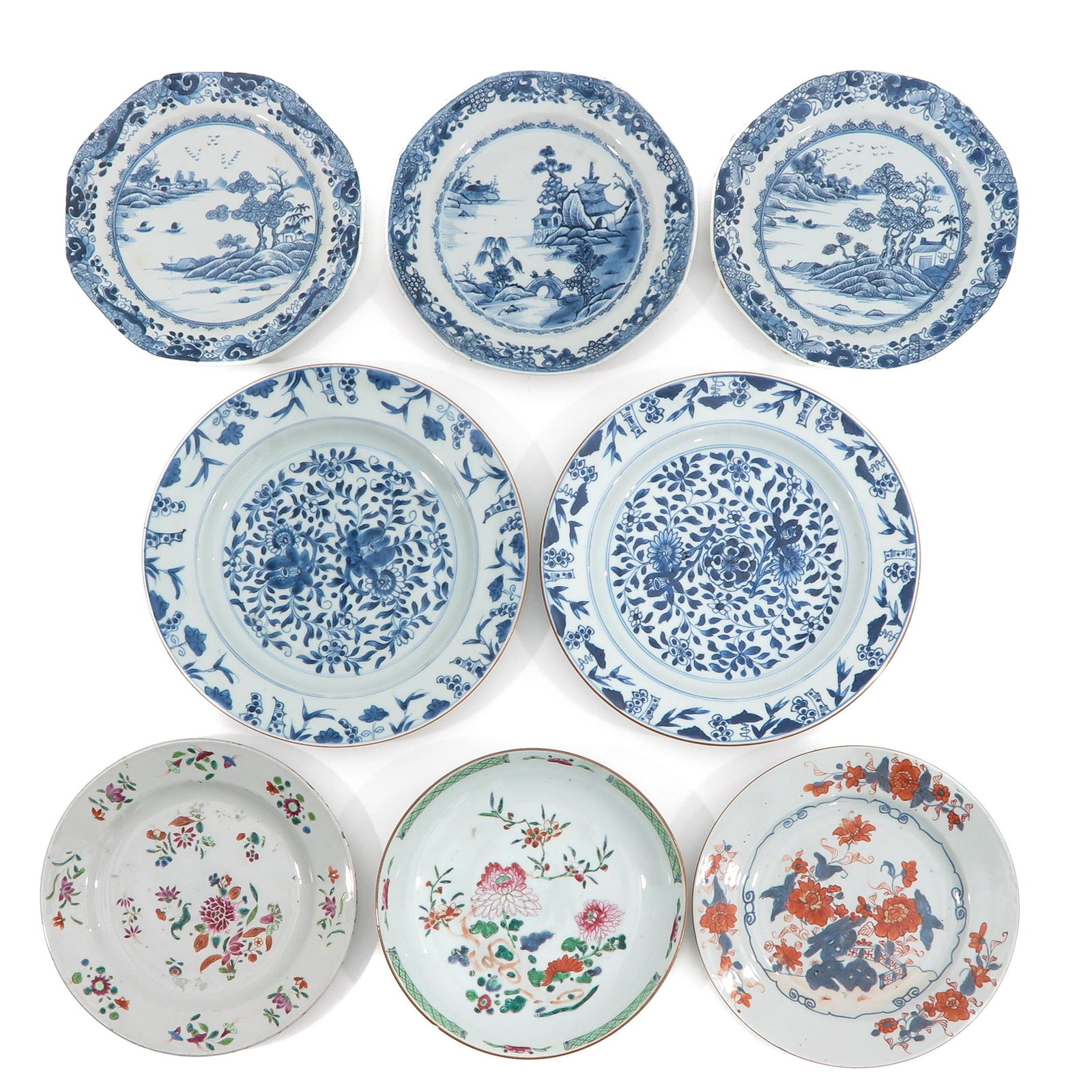 A Collection of 8 Plates: In a variety of decors and sizes, including 18th Century, largest plate is 28 cm. in diameter, chip and hairline.