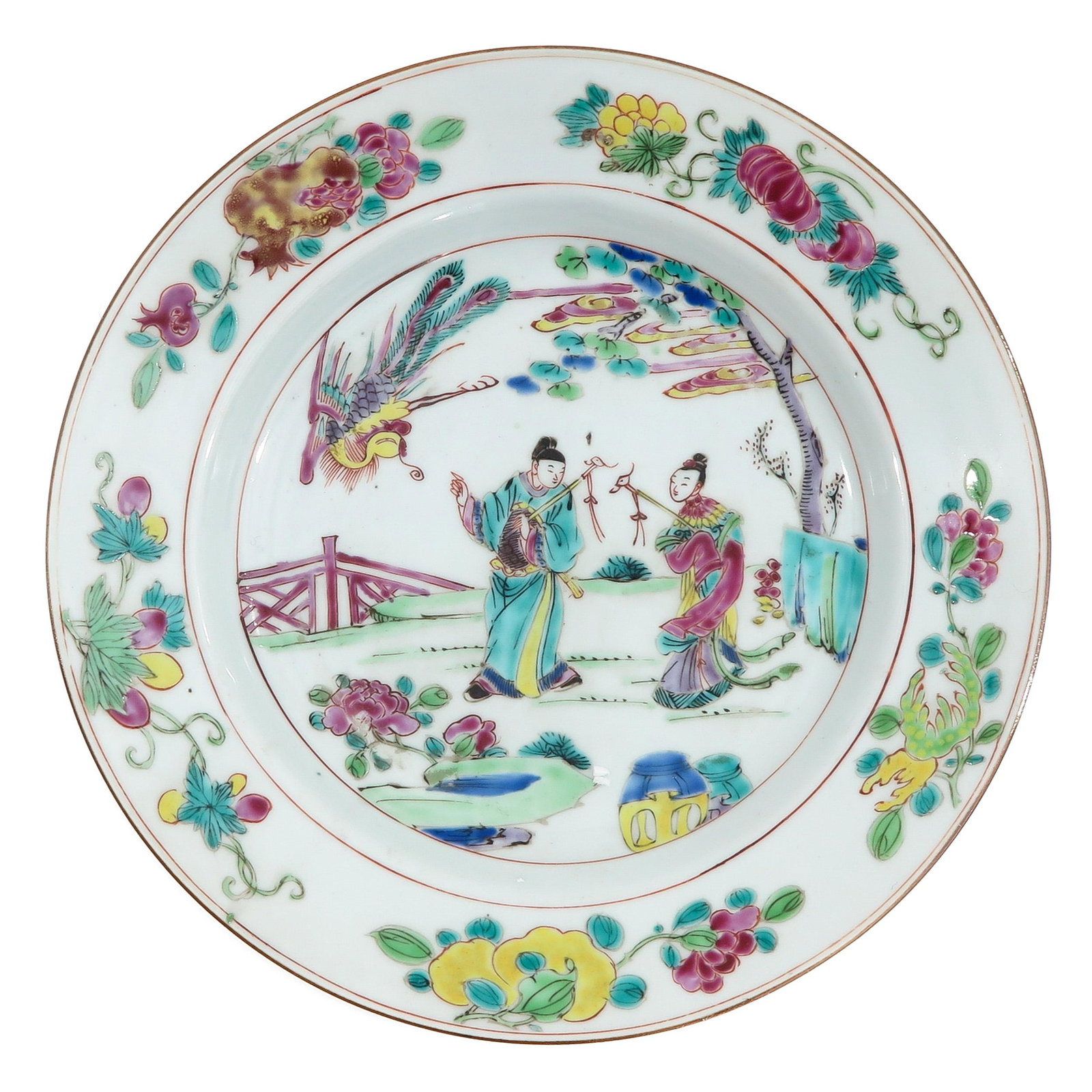 A Famille Rose Plate: Depicting Chinese figures in garden with bird of paradise, 18th Century, 22 cm. in diameter.