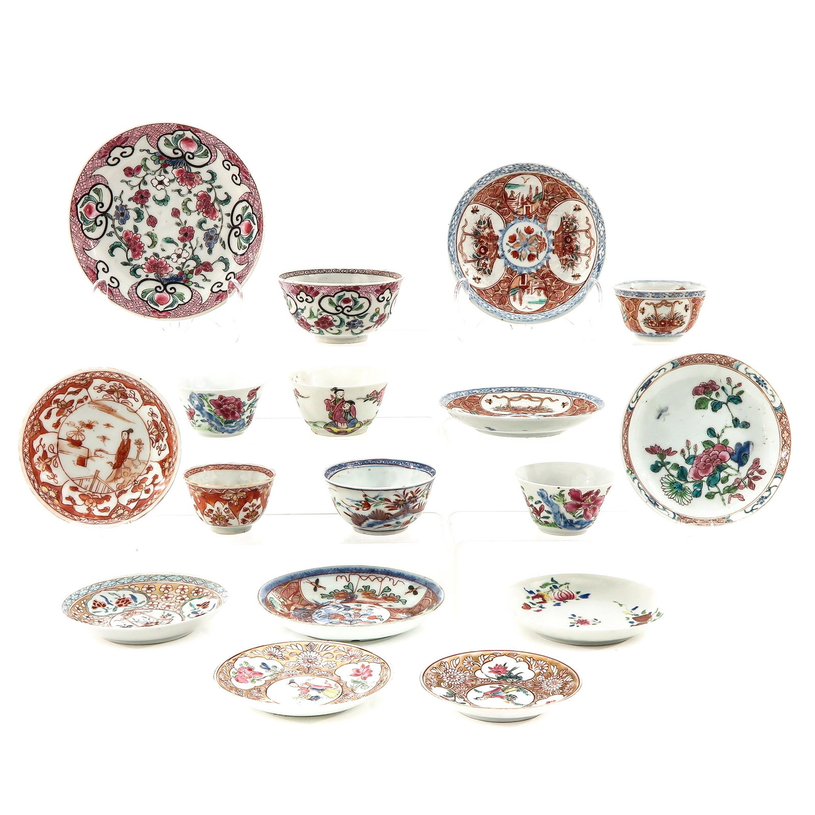 A Collection of Cups and Saucers: In a variety of decors and sizes, including 18th Century, largest saucer is 14 cm. in diameter, chip and hairline.