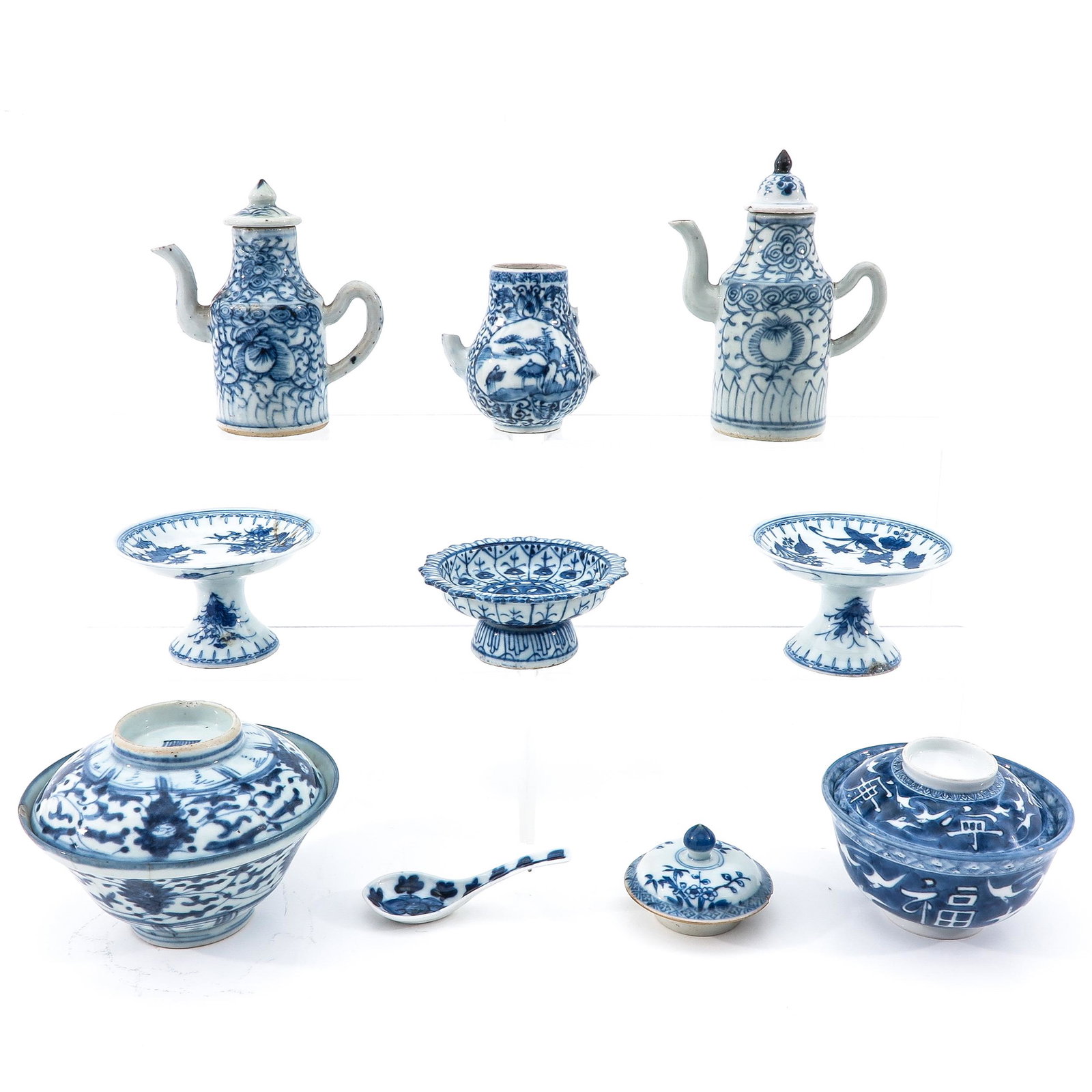 A Diverse Collection of Porcelain: 10 pieces, including bowls, stem cups, teapots, and other items, teapots are 15 cm. tall, in diverse conditions.