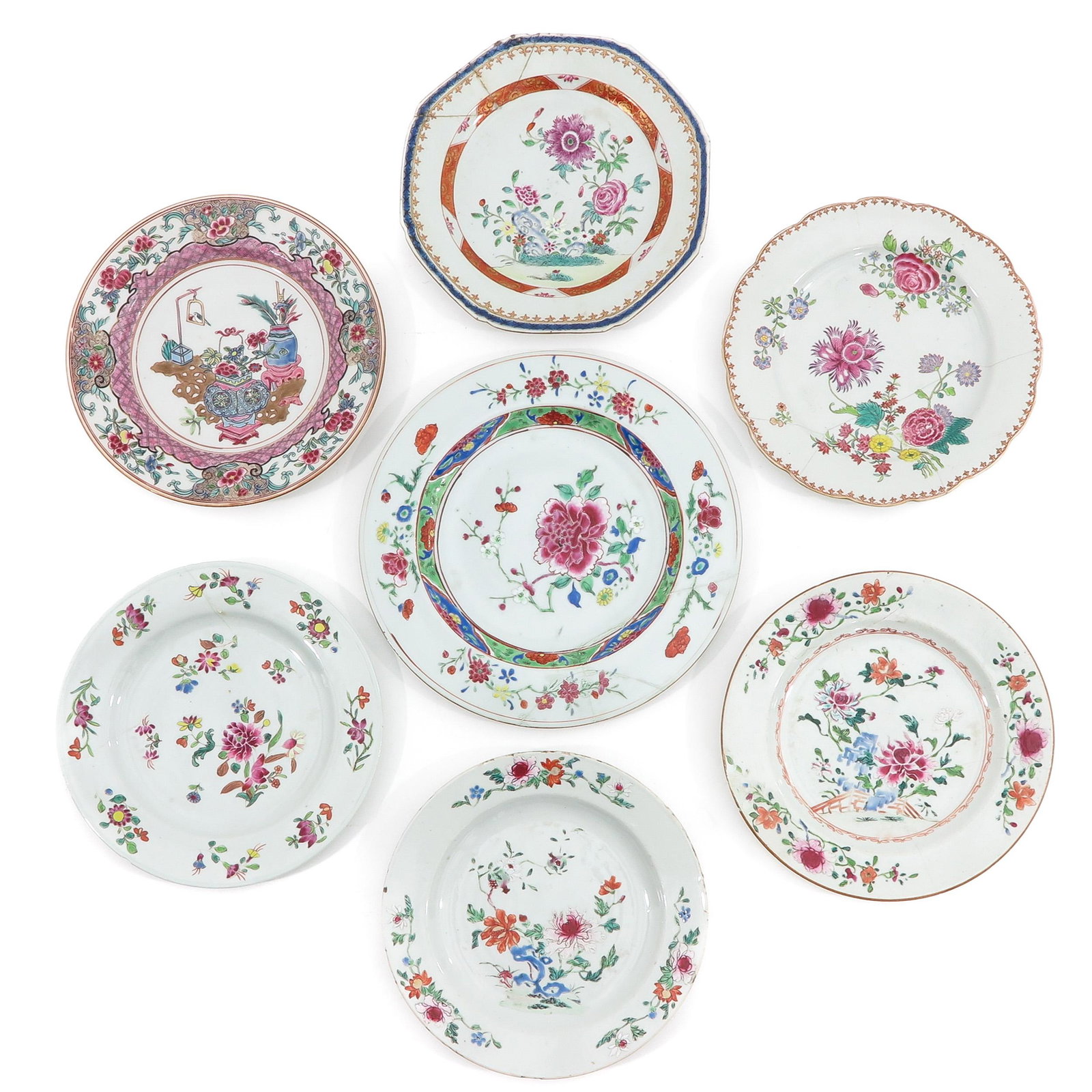 A Collection of 7 Plates: In a variety of decors and sizes, including 18th Century, largest plate is 27 cm. in diameter, in diverse conditions.