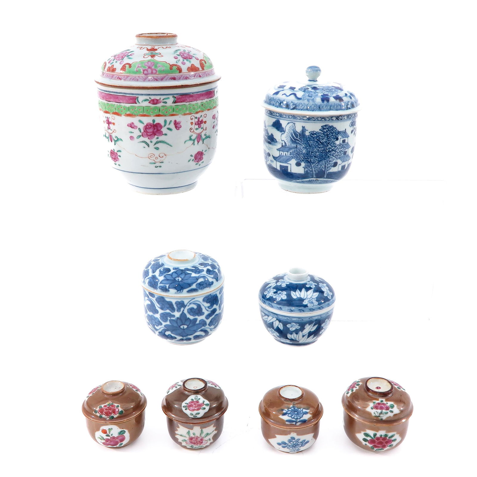 A Collection of 8 Jars with Covers: Tallest jar is 16 cm., with restorations.