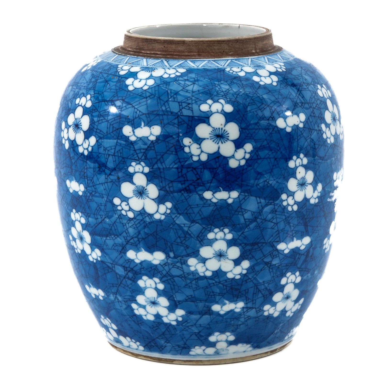 A Blue and White Ginger Jar: Blue ground with white flower blossom decor, 21 cm. tall.
