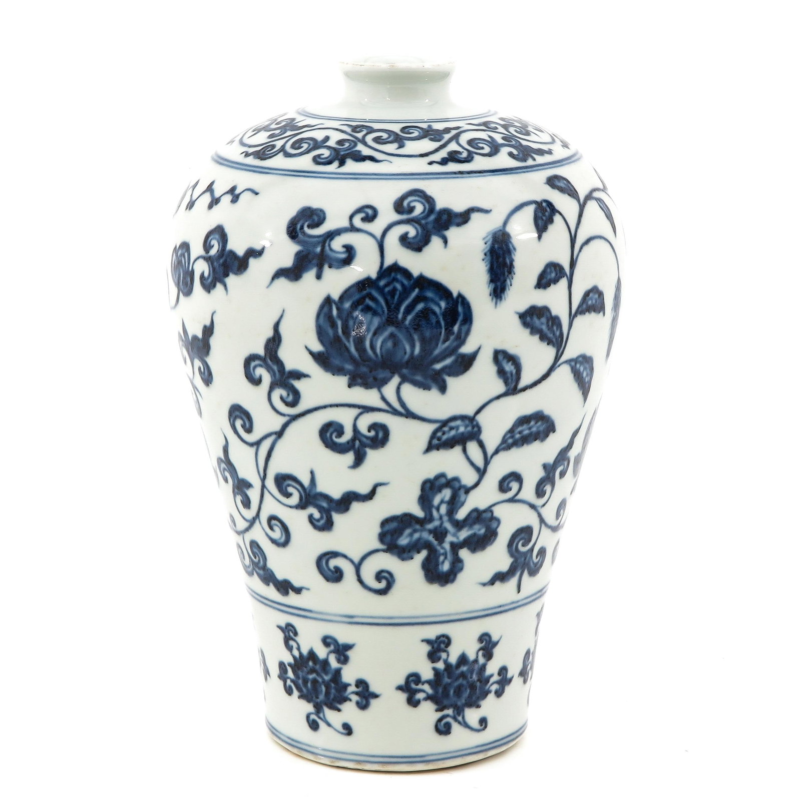 A Blue and White Meiping Vase: Floral decor, 28 cm. tall, baking fault in glaze.