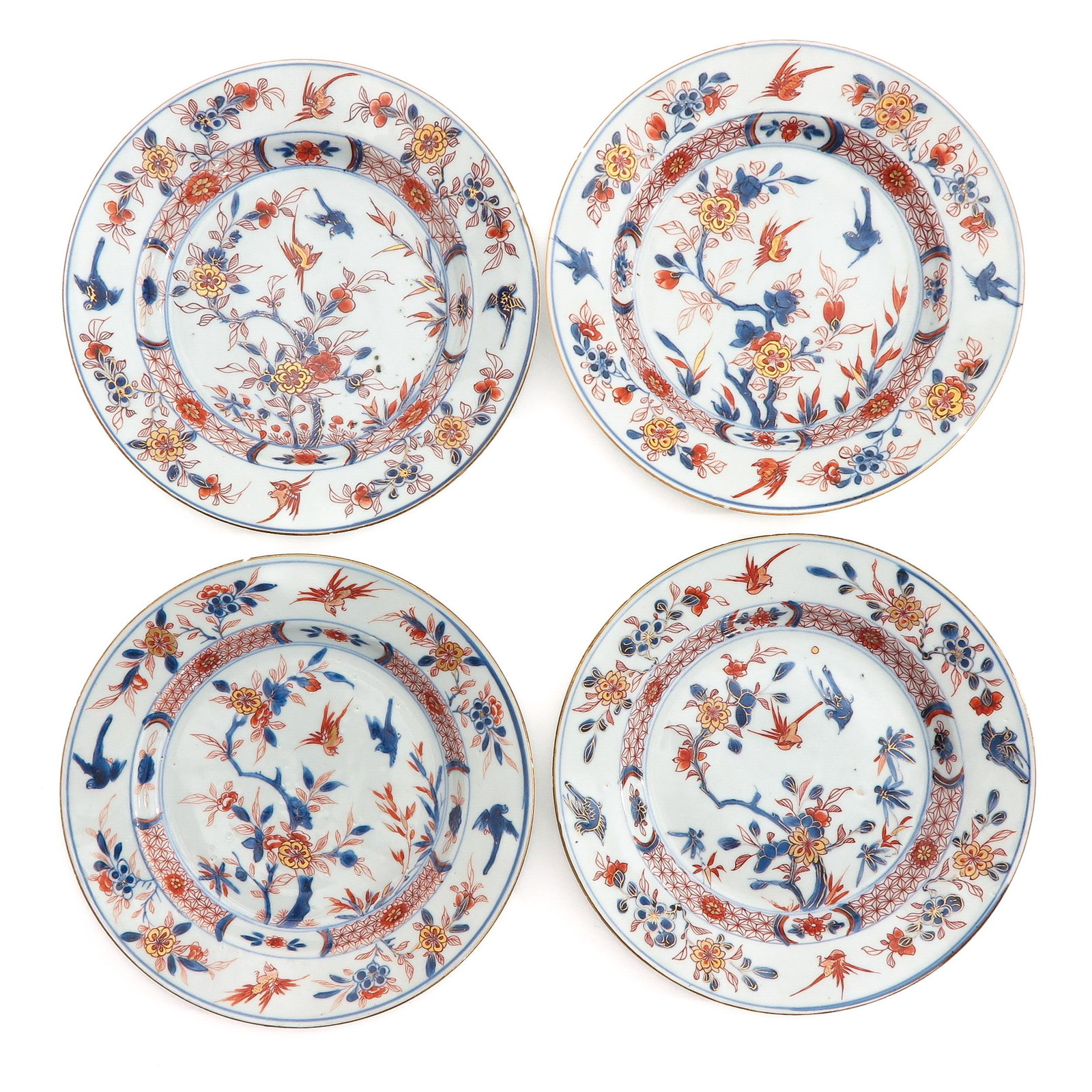 A Series of 4 Imari Decor Plates: Floral decor, 18th Century, 22 cm. in diameter, chip.