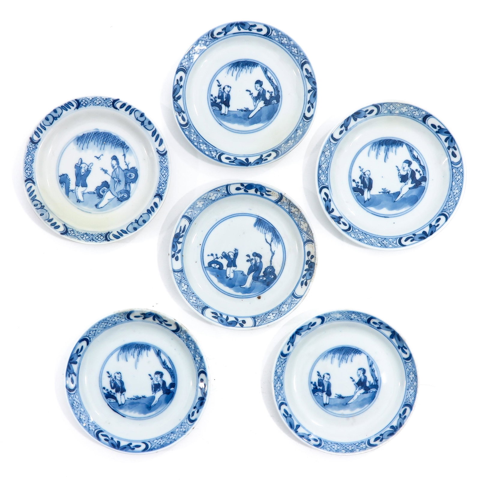 A Collection of 6 Blue and White Plates: Depicting Chinese lady with boy in garden, 13 cm. in diameter, with restoration.