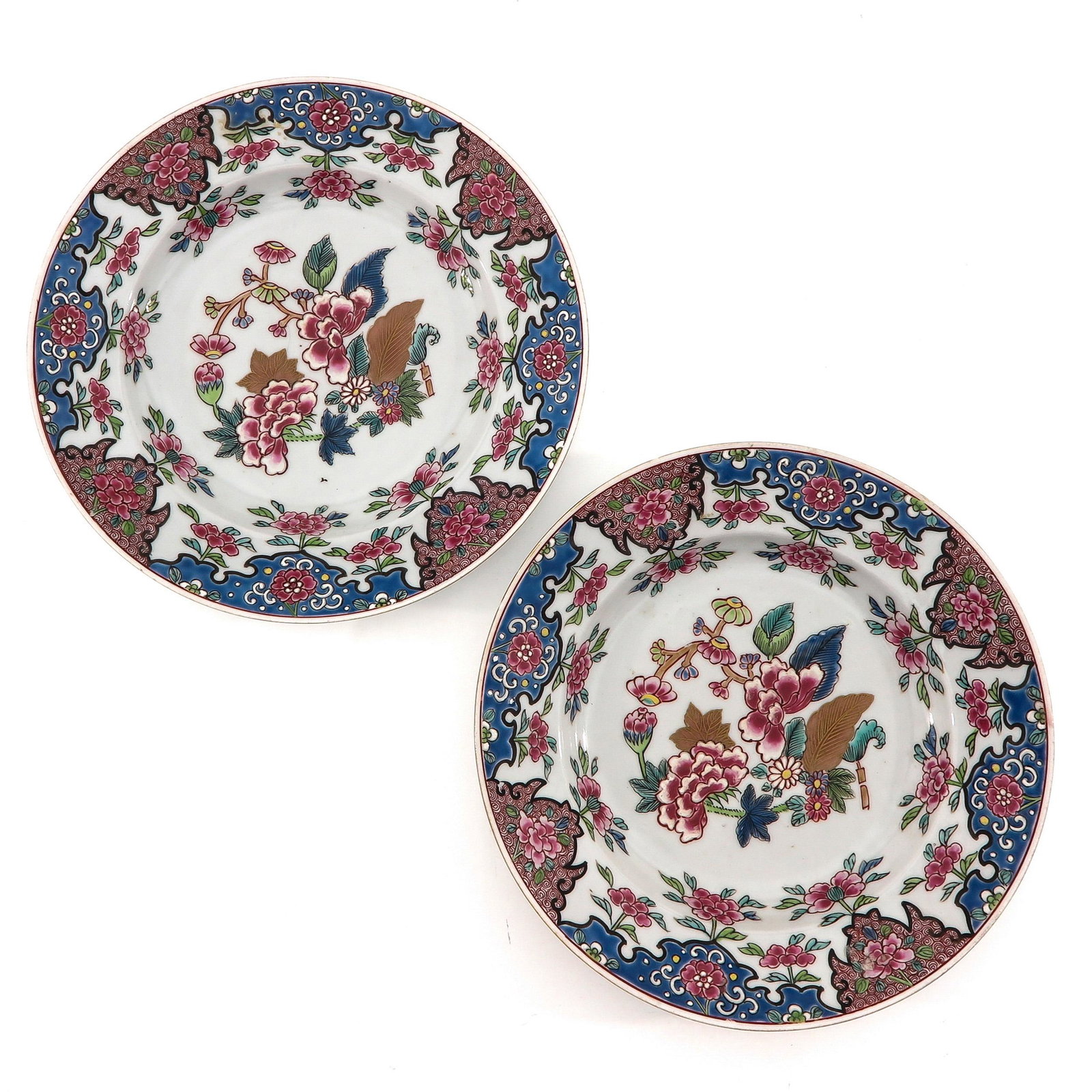 A Pair of Famille Rose Plates: Floral decor, 23 cm. in diameter.