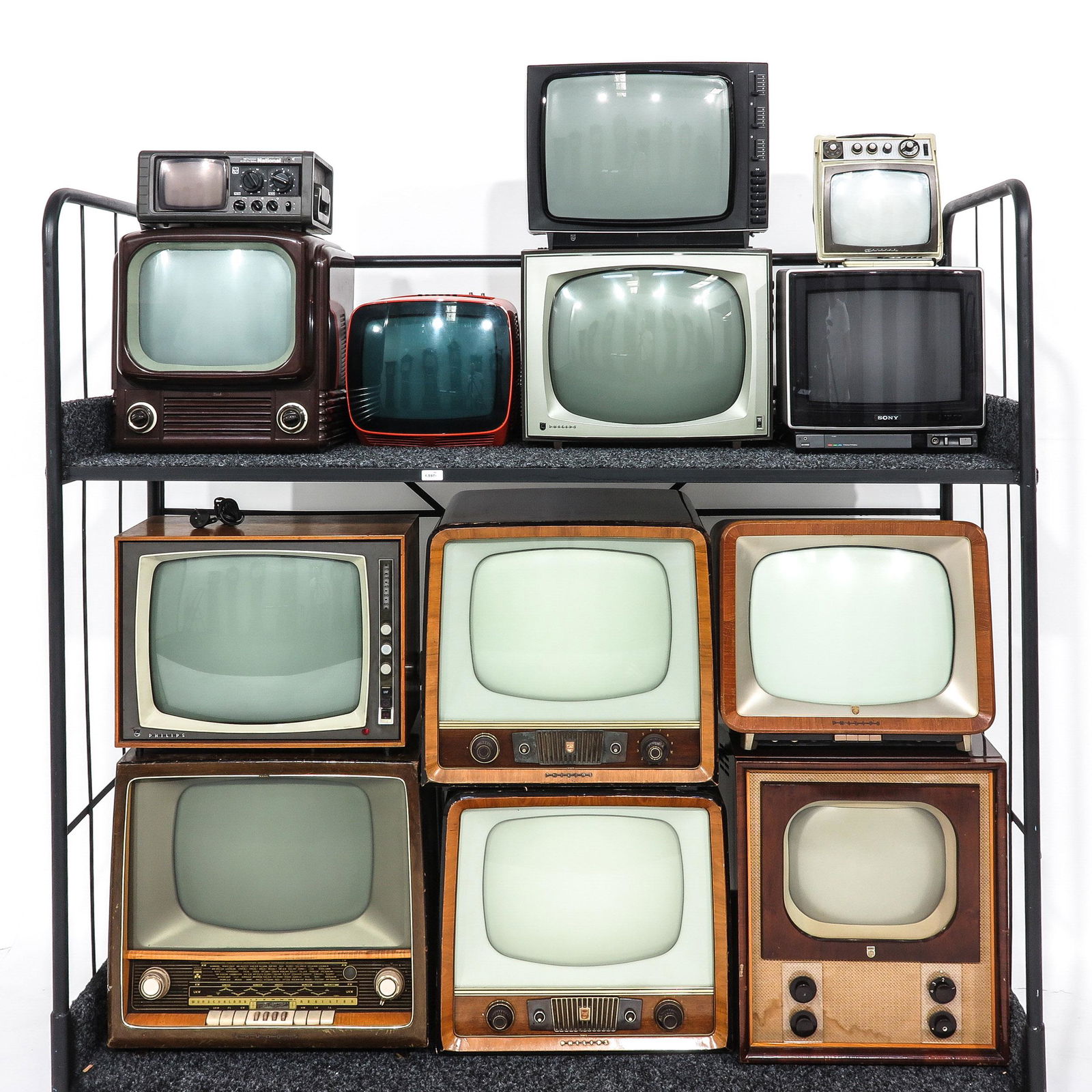 A Collection of 13 Vintage Televisions: Including National, tallest television is 52 cm. This lot will not be shipped.