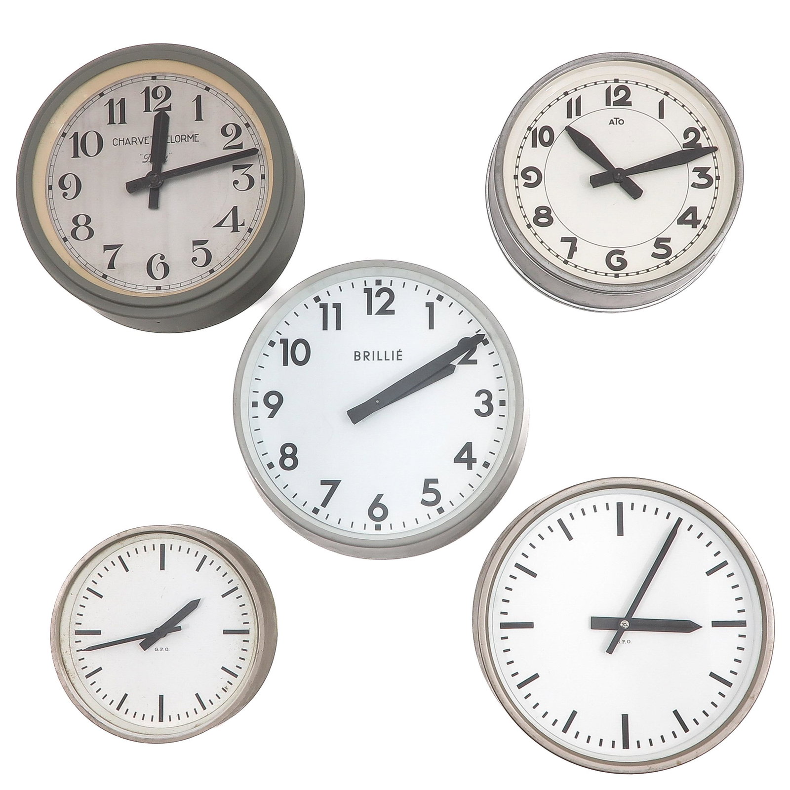 A Lot of 5 Electric Clocks: Including Charvet-Delorme, largest clock is 31 cm. in diameter. This lot will not be shipped.