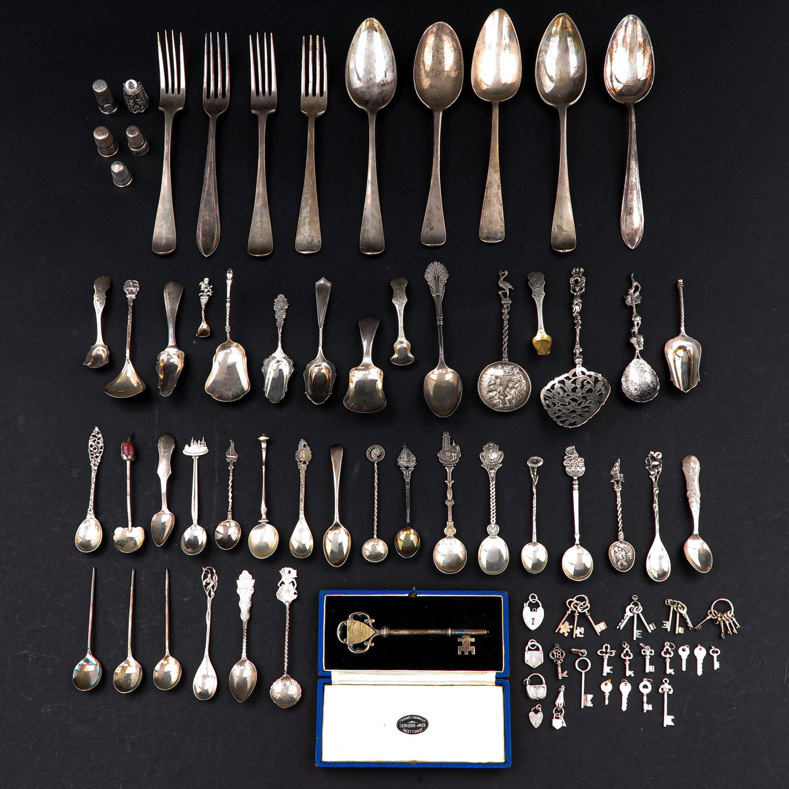 A Collection of Silver: Including cutlery and opportunity key given to Majorm E.J. Donaldson, Glasgow, 1952.