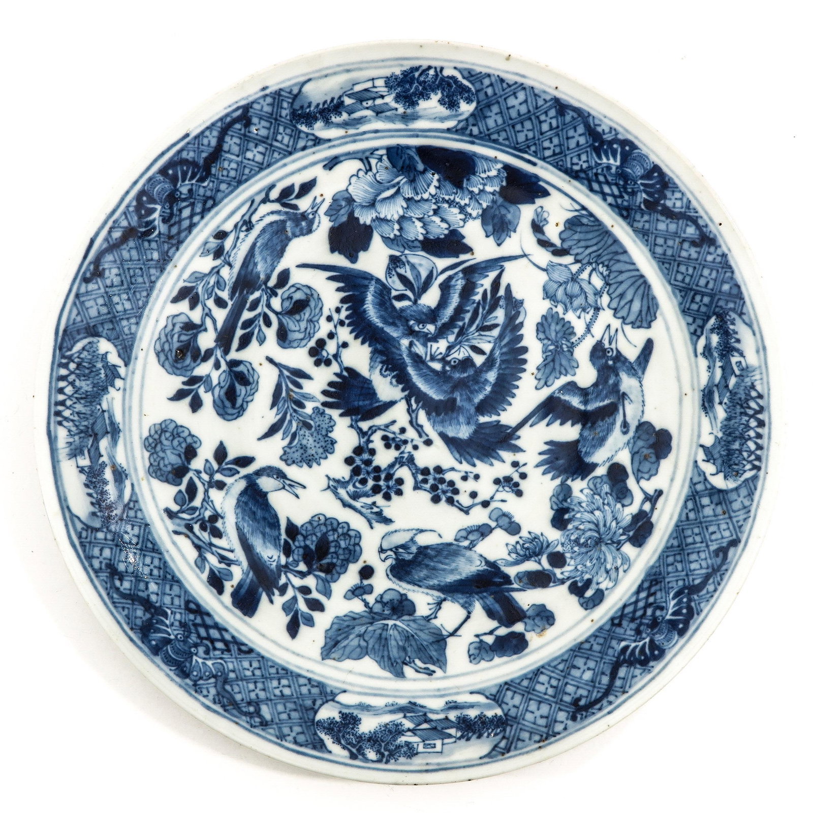 A Blue and White Plate: Decorated with birds and flowers, 30 cm. in diameter.