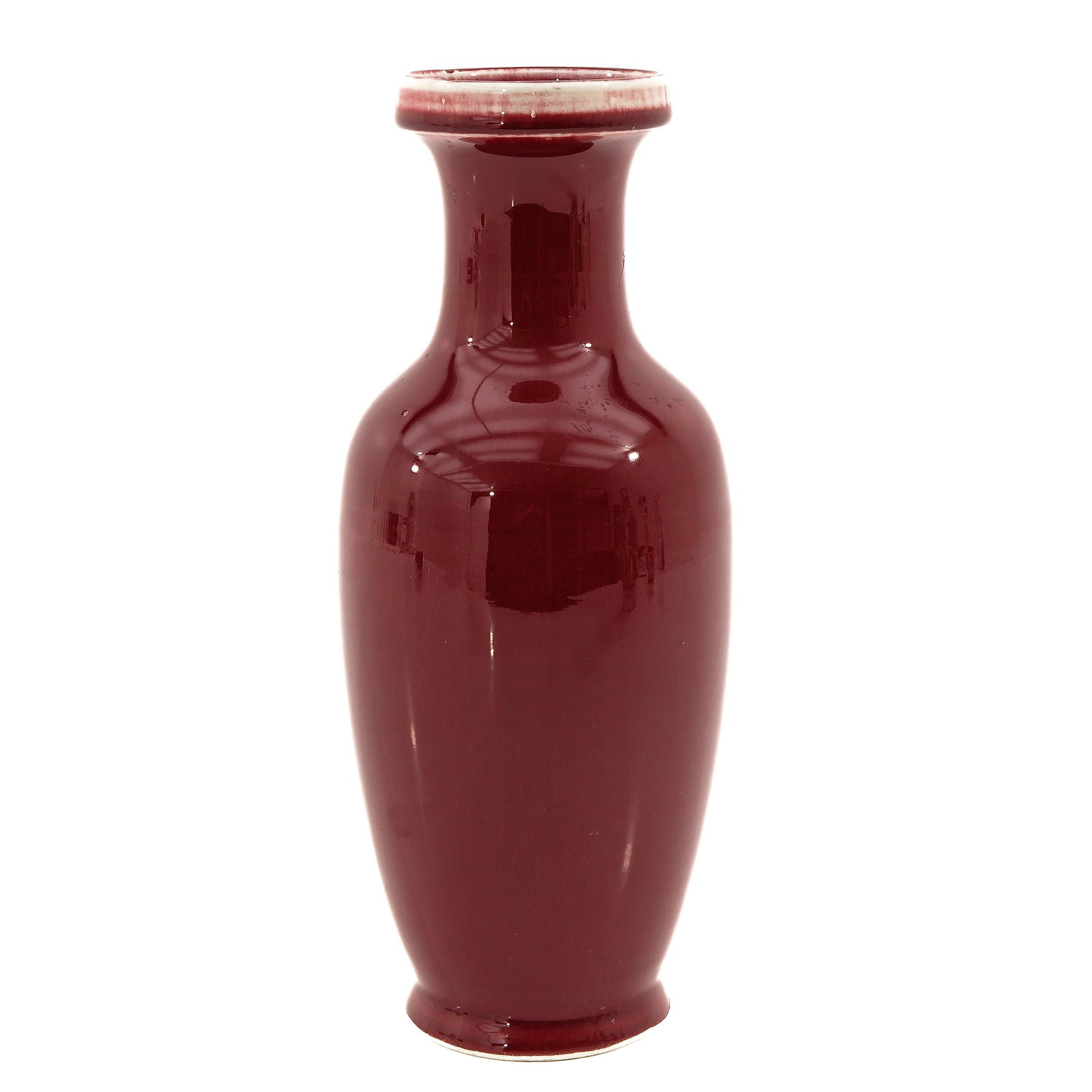 A Sang de Boeuf Vase: 32 cm. tall, chip on stand ring.