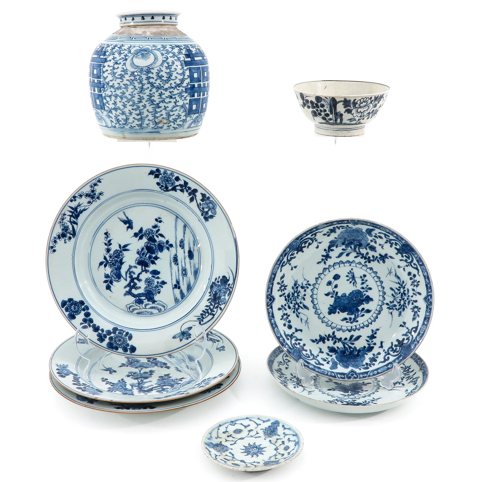 A Collection of Porcelain: 8 pieces, including chargers, plate, bowls, and ginger jar 21 cm. tall, in diverse conditions.